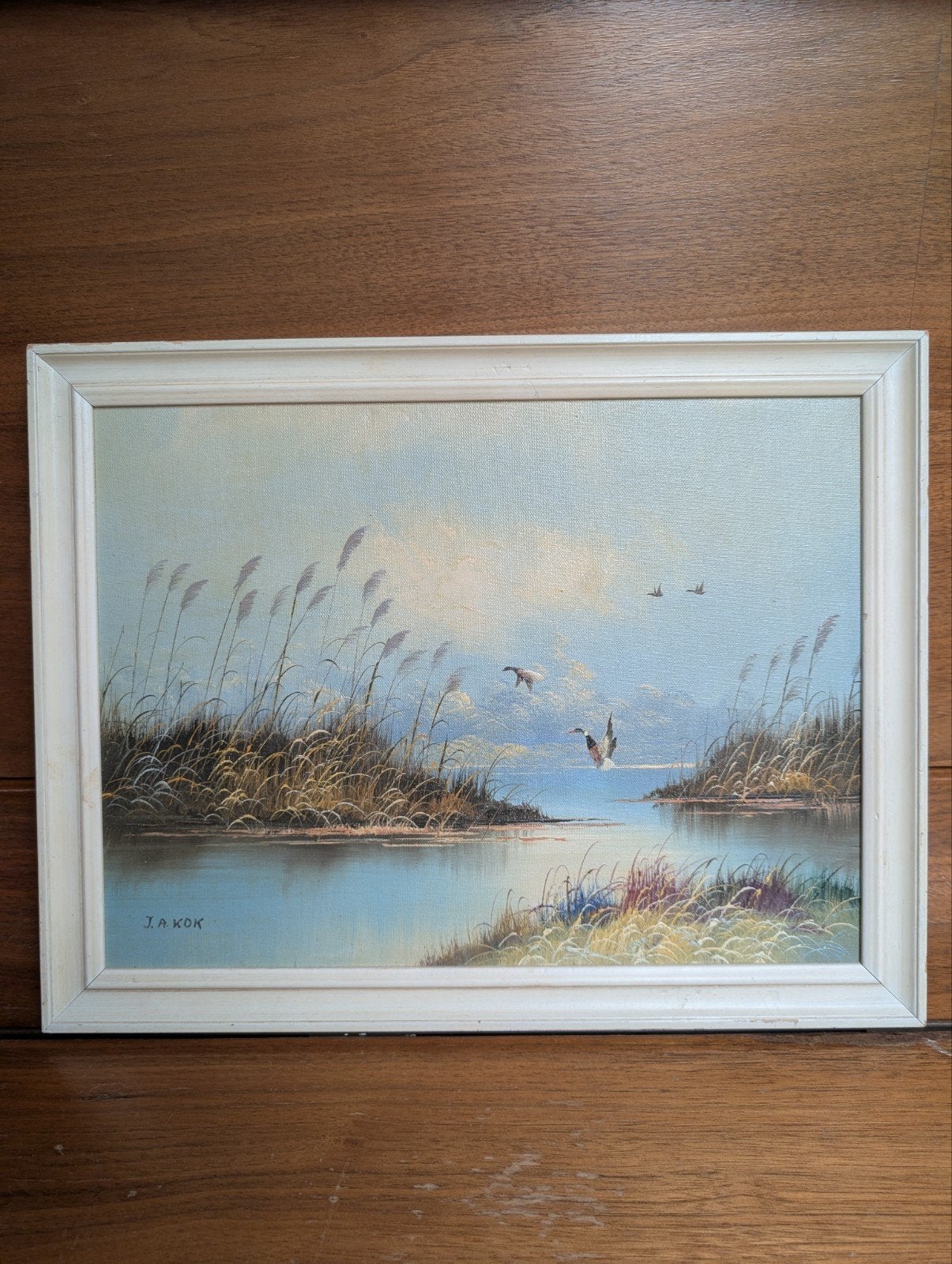 Schilderij van J.A. Kok: Vliegende eenden boven water, Antiek en Kunst, Ophalen, Doek, Realistisch, Dieren