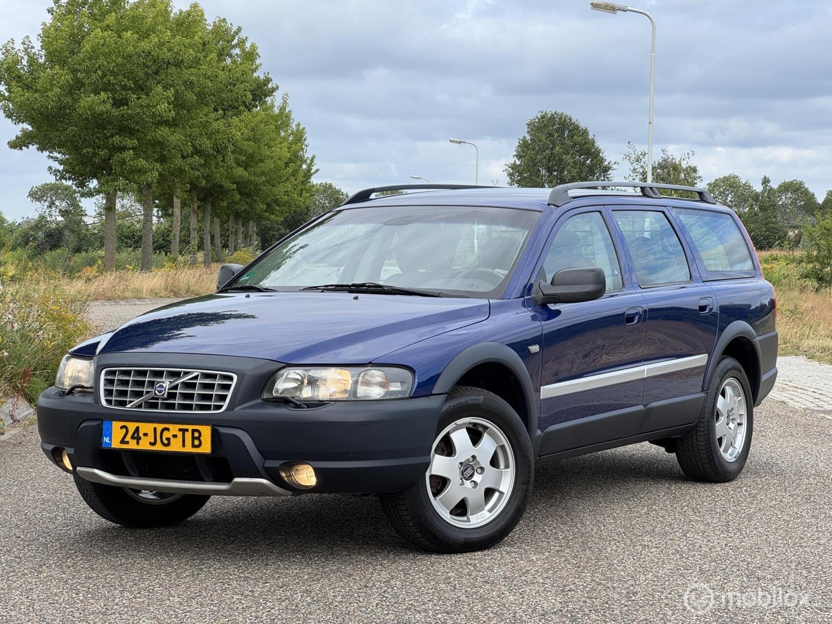 Volvo XC70 2.4 T AWD Ocean Race, Auto's, 2495 cc, Blauw, XC70, Vierwielaandrijving