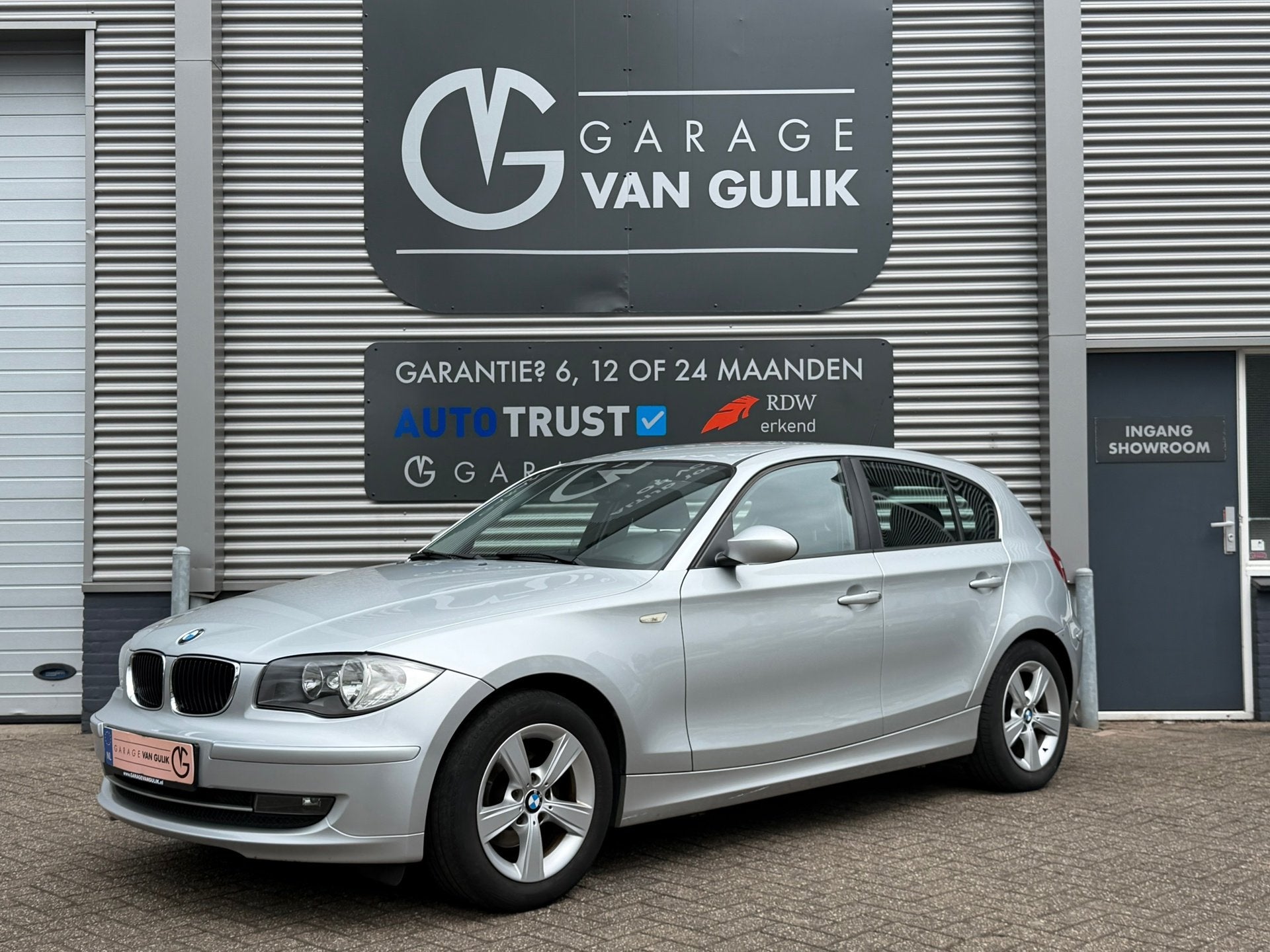 BMW 1-serie 116i 122PK ClimateCtrl,Stoelverw.,Lmv,Pdc,Keyles, Auto's, 1-Serie, Euro 5, Zwart, 4 cilinders