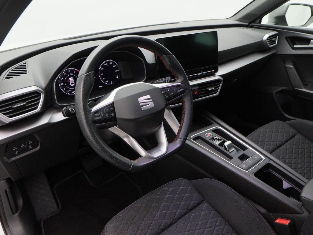 SEAT Leon Sportstourer 1.0 eTSi 110 Pk Automaat FR Business, Auto's, Stof, Gebruikt, 700 kg, Leon