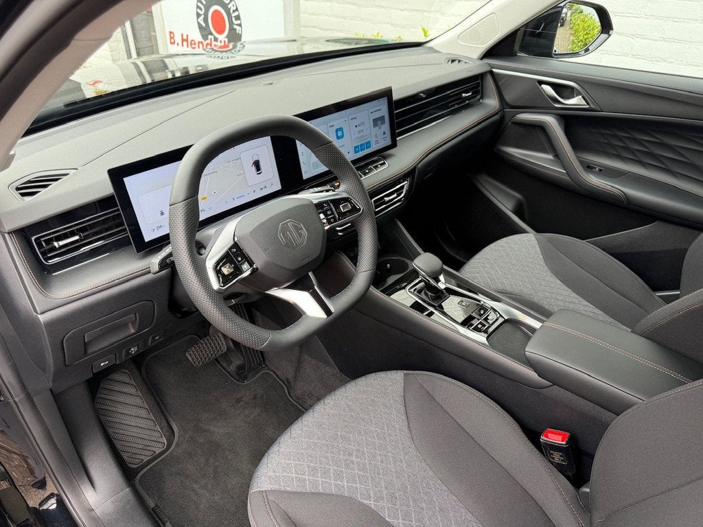 MG Hs 1.5T GDI PHEV Aut Comfort/ Nieuwe voorraad auto/ 100 K, Auto's, MG, Stof, Gebruikt, 4 cilinders, Zwart