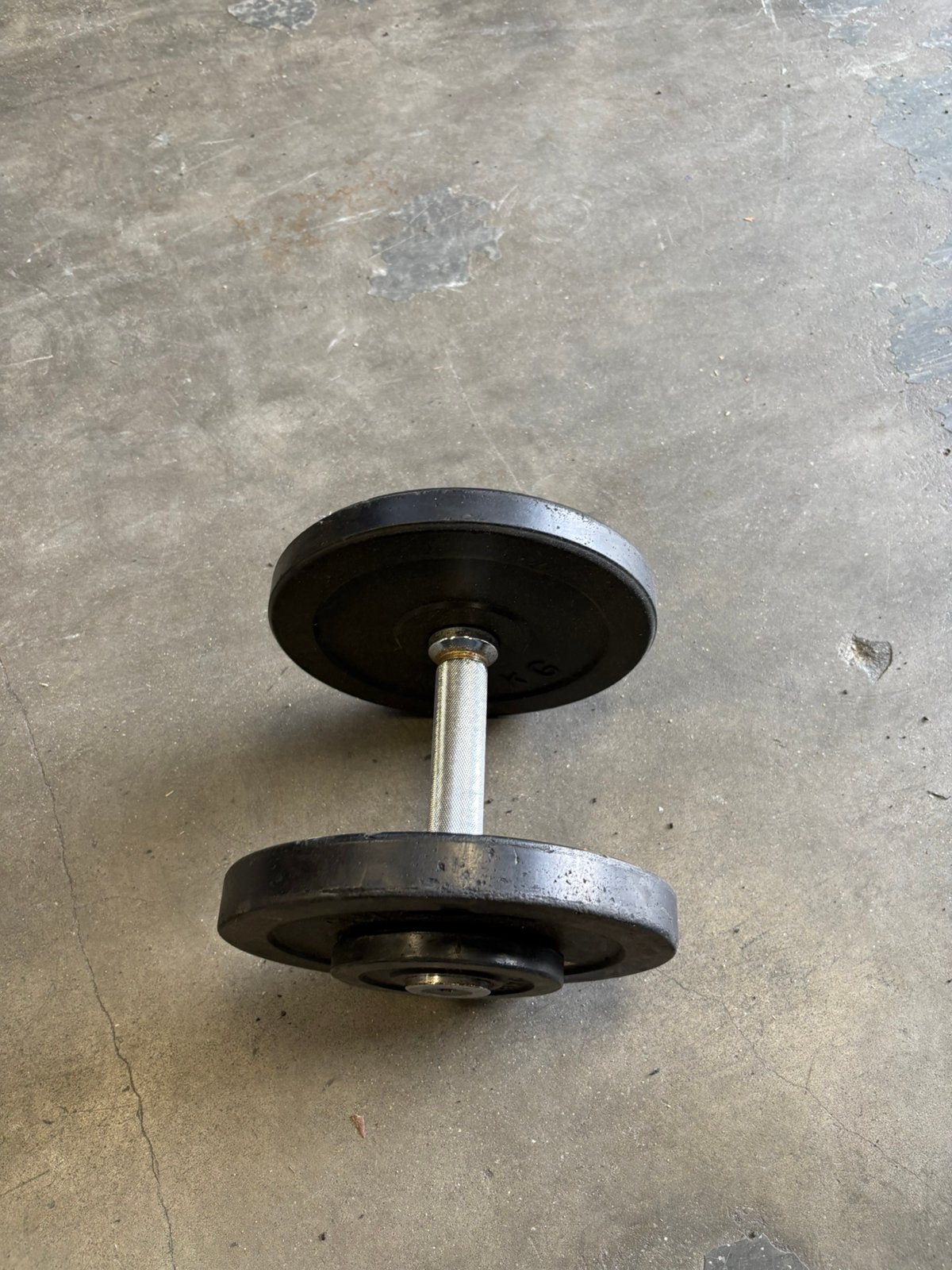 1 x 12 kg dumbbell gewicht, Gebruikt, 1 x 12 kg, Ophalen of Verzenden, Gewicht