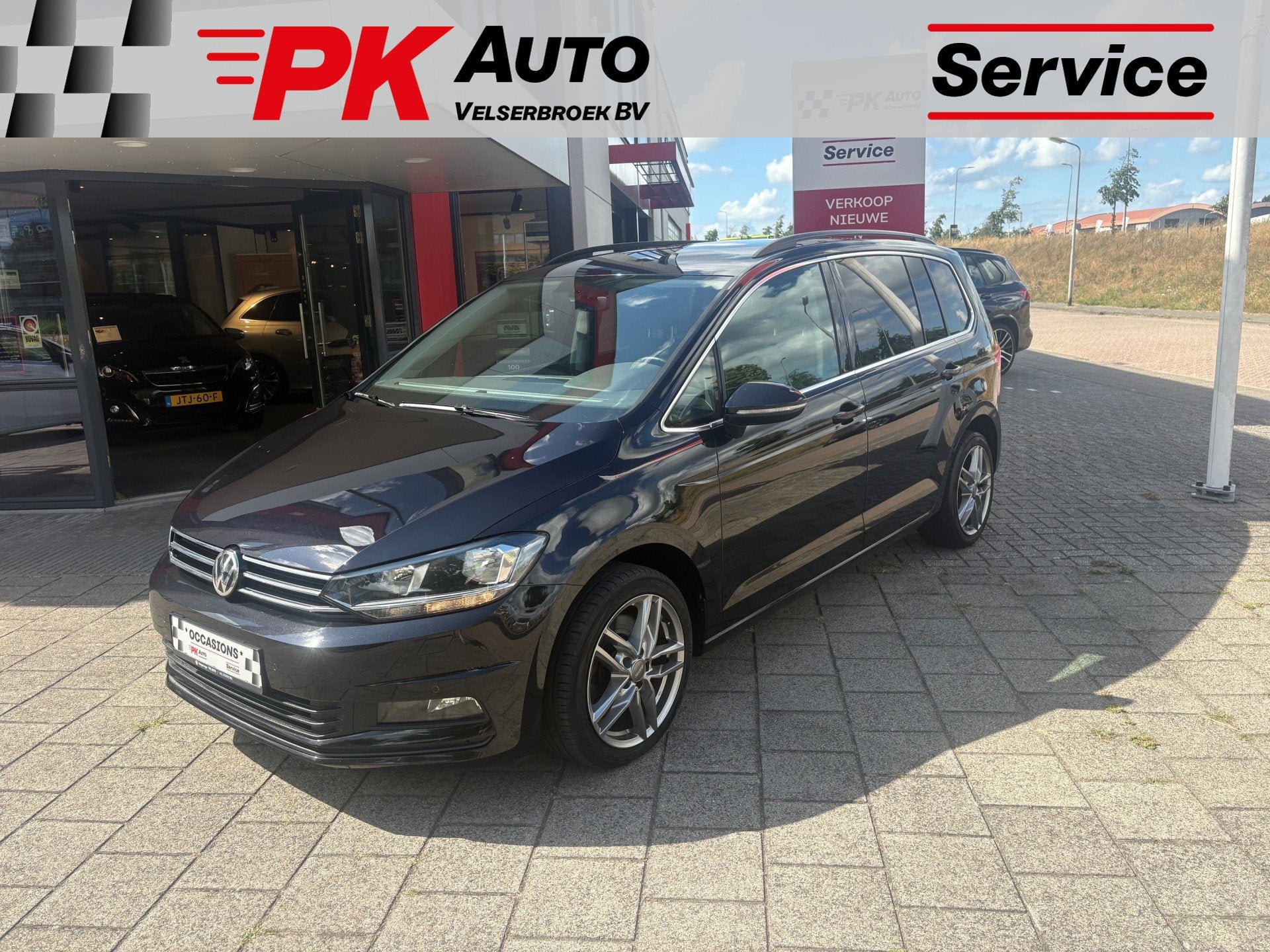 Volkswagen Touran 1.5 TSI Comfortline Business 7p | Navi | T, 12 maanden, 4 cilinders, 7 stoelen, Zwart