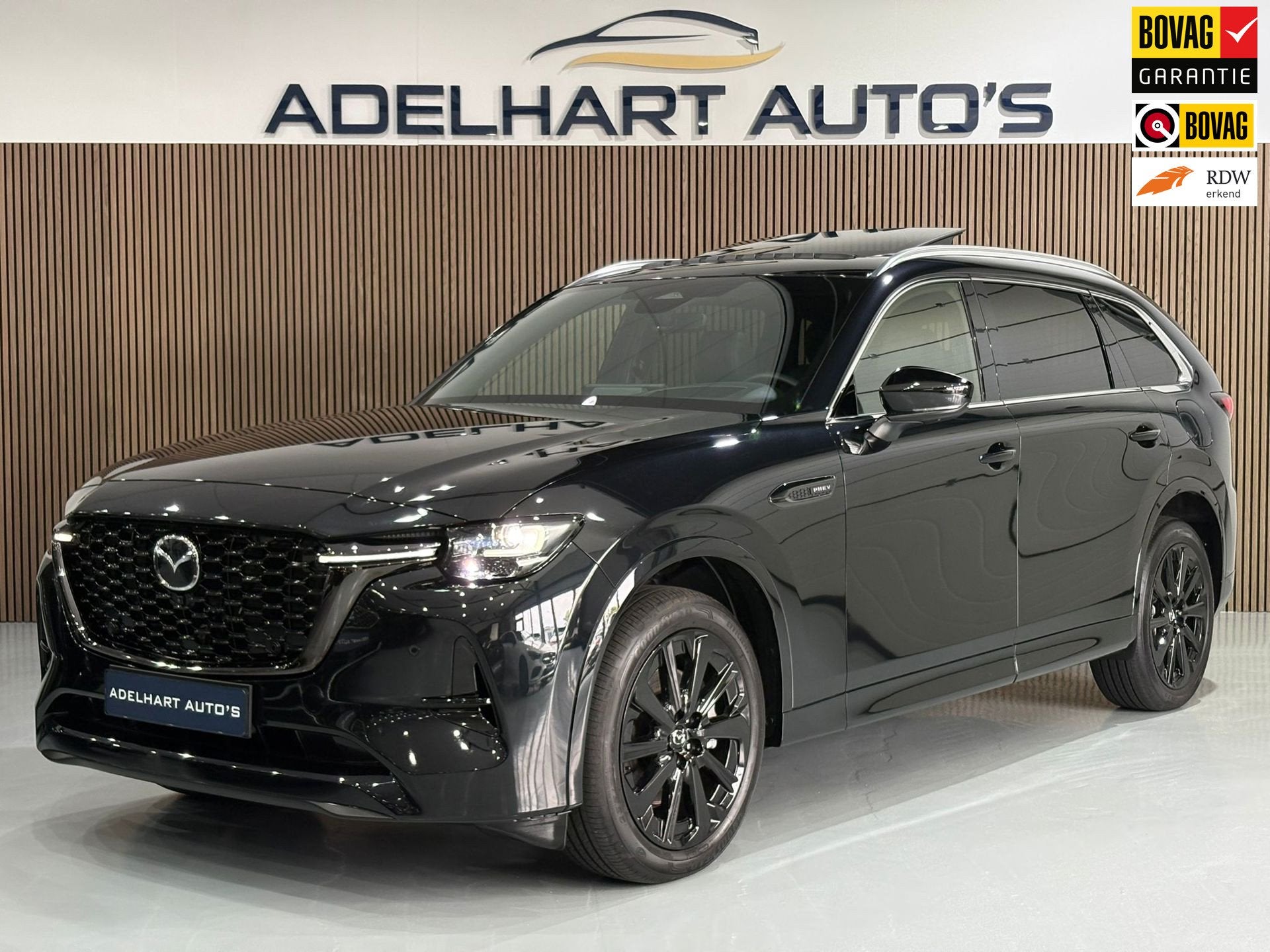 Mazda CX-80 2.5 e-SkyActiv PHEV Homura Plus 7 Pers 327 PK /, Auto's, Automaat, Dealer onderhouden, Gebruikt, Zwart