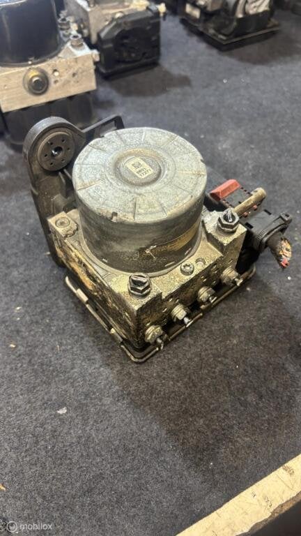 ABS pomp Volkswagen Golf VII ('12->) 5Q0614517CF, Gebruikt, Volkswagen, Ophalen of Verzenden, Volkswagen