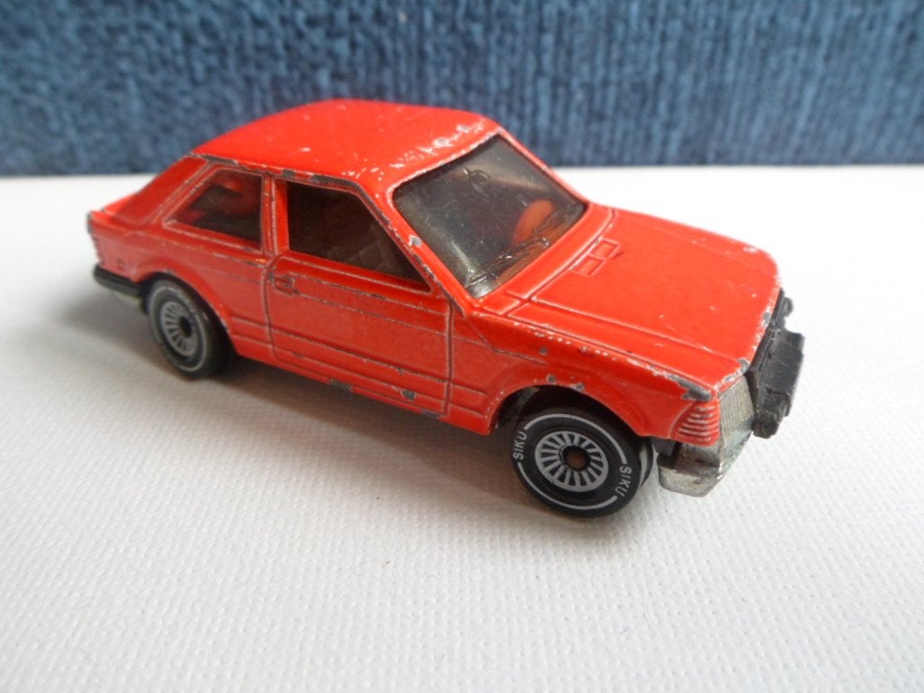 Siku 1048 - Ford Escort GL [oranje] 1/55, Ophalen of Verzenden, Gebruikt, Auto