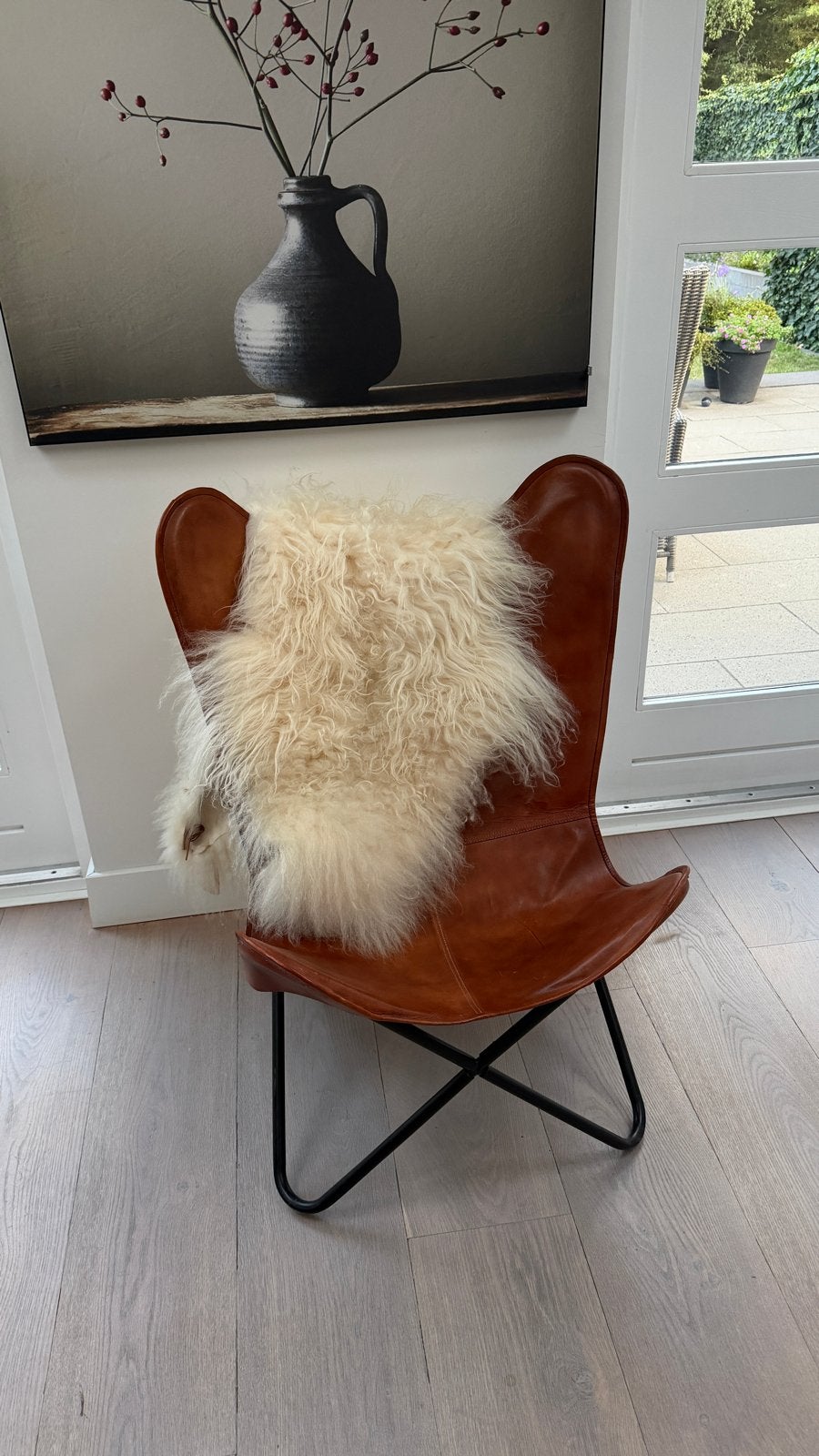Vlinderstoel kunstleer met schapenvacht - Zo goed als nieuw, Ophalen, Bruin, Leer, Zo goed als nieuw