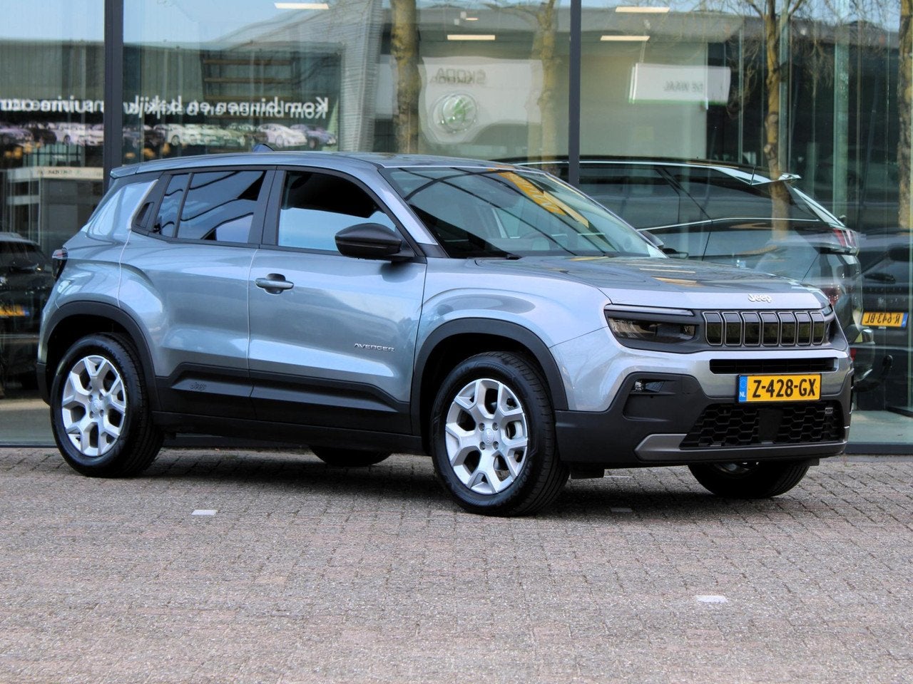 Jeep Avenger 1.2 Longitude | Navi / Camera / Stoelverwarming, Auto's, 101 pk, Gebruikt, 1199 cc, Bedrijf