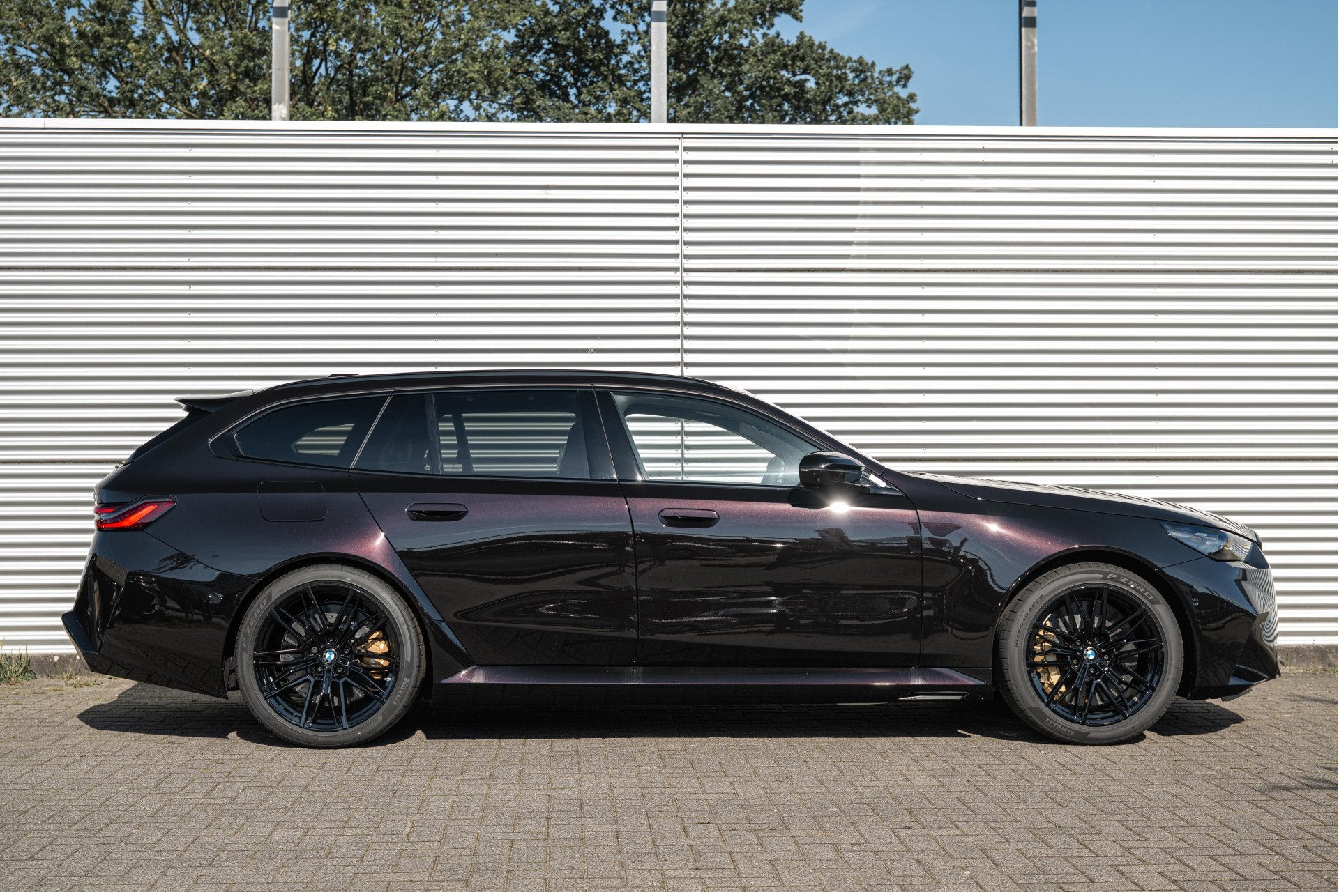 BMW 5 Serie Touring M5 Automaat / Trekhaak / Panoramadak / C, Auto's, 4395 cc, Zwart, Leder, Hybride Elektrisch/Benzine