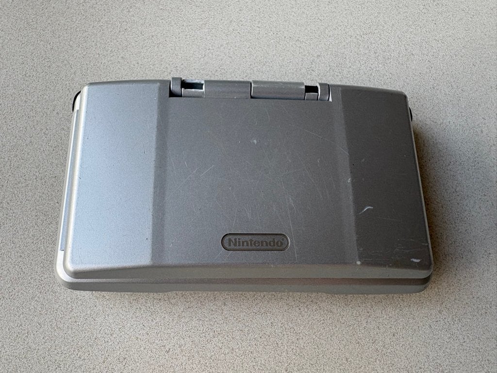 Nintendo DS Phat (defect), Ophalen of Verzenden, Niet werkend, Zilver, DS Original of Phat