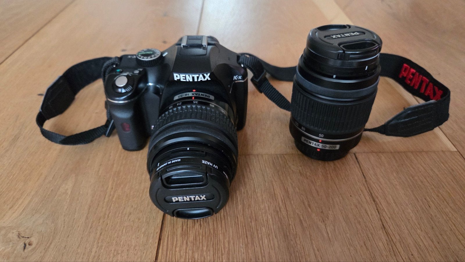 Pentax K-x Spiegelreflexcamera met twee lenzen, Audio, Tv en Foto, Spiegelreflex, Ophalen of Verzenden, Zo goed als nieuw, Draagriem