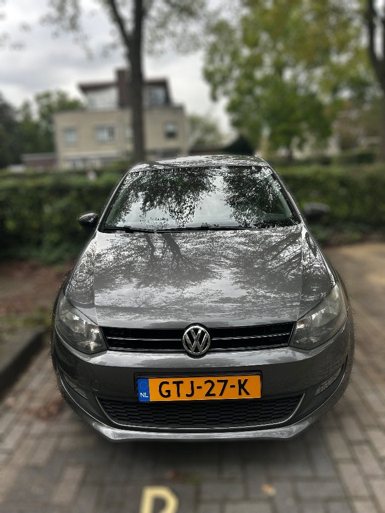 TE KOOP! Volkswagen Polo 1.2 51KW 2012 Grijs, Auto's, Voorwielaandrijving, Zwart, Handgeschakeld, Particulier