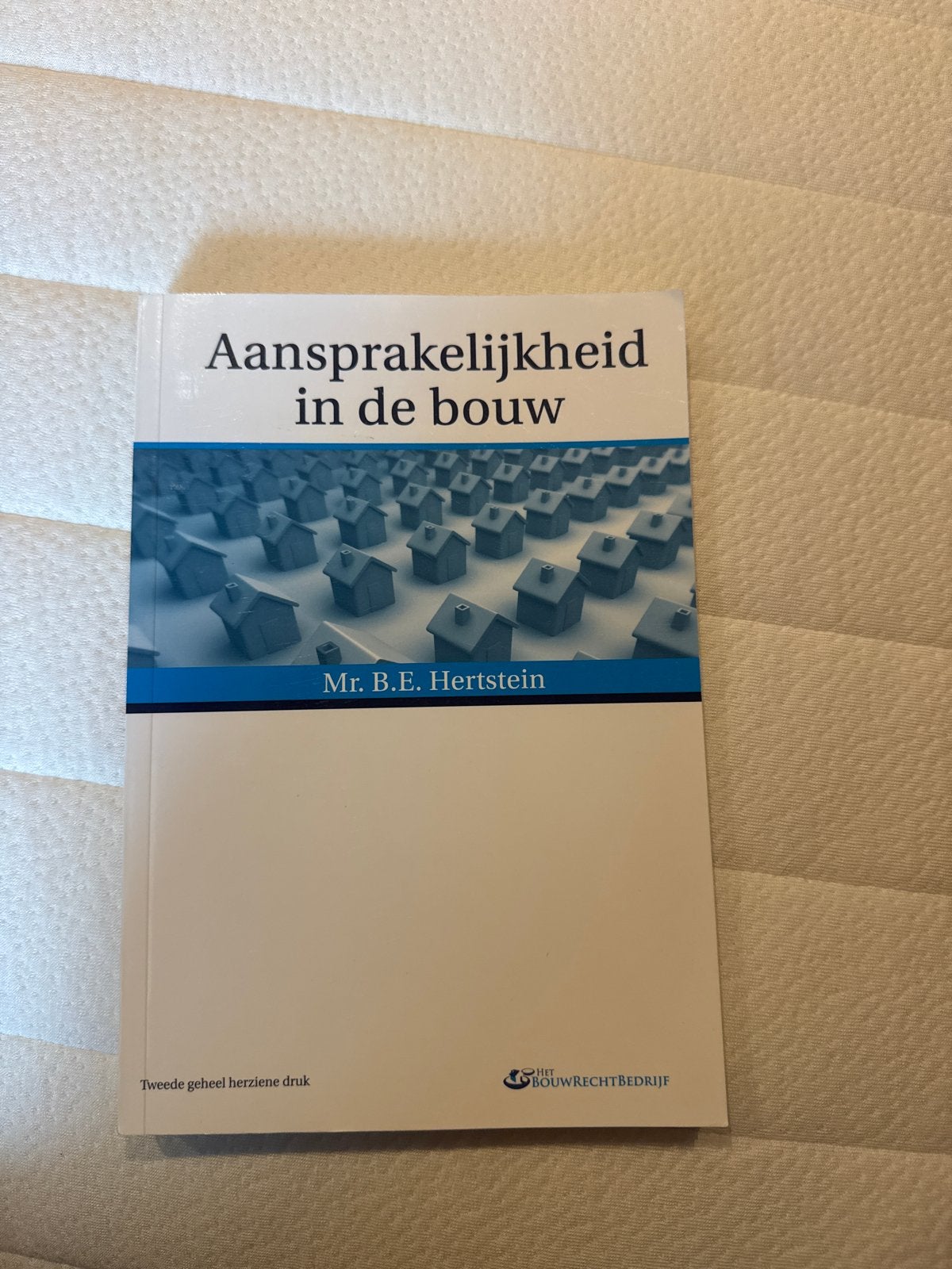 Aansprakelijkheid in de bouw - Mr. B.E. Hertstein, Boeken, Ophalen of Verzenden, Gamma, Zo goed als nieuw, HBO