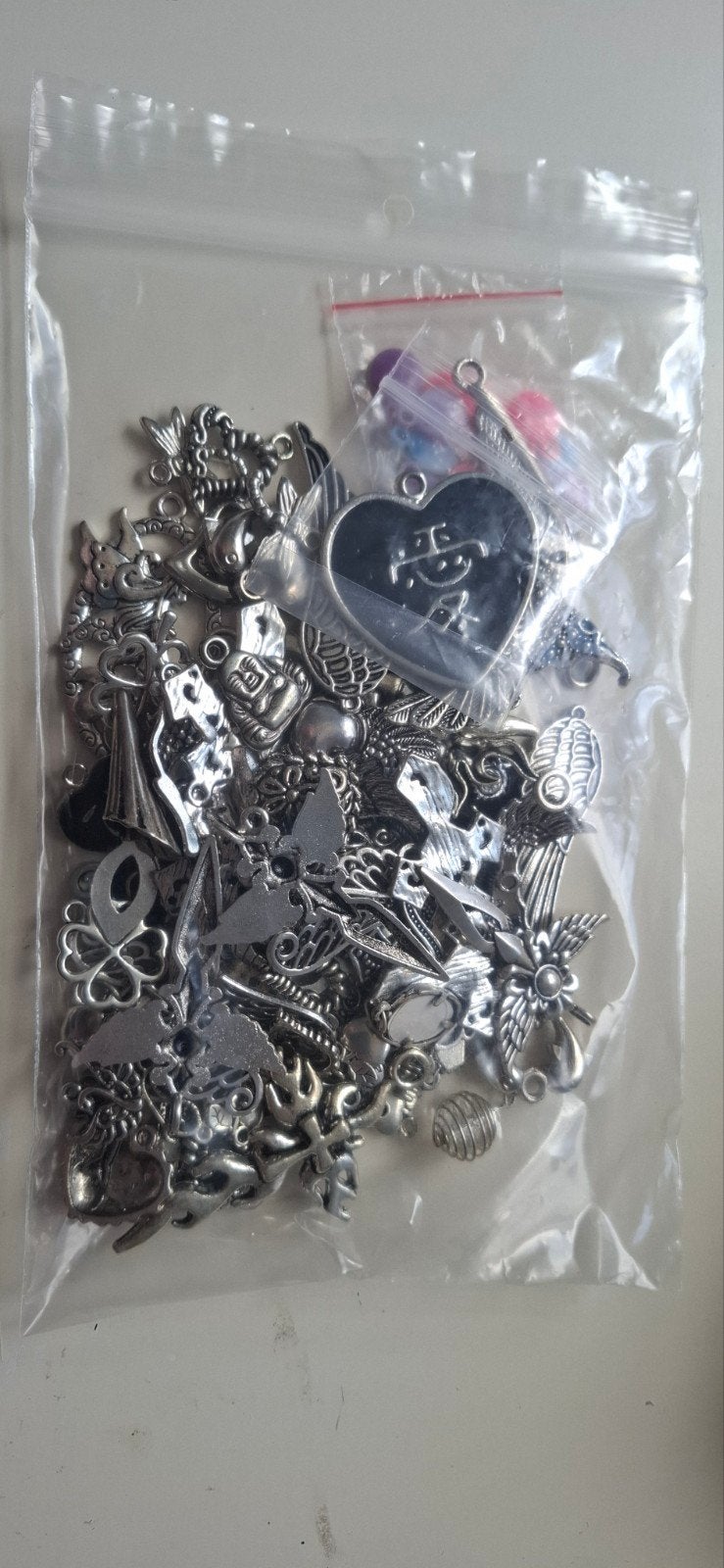 220 gram bedels hangers diverse, Ophalen of Verzenden, Nieuw, Bedel