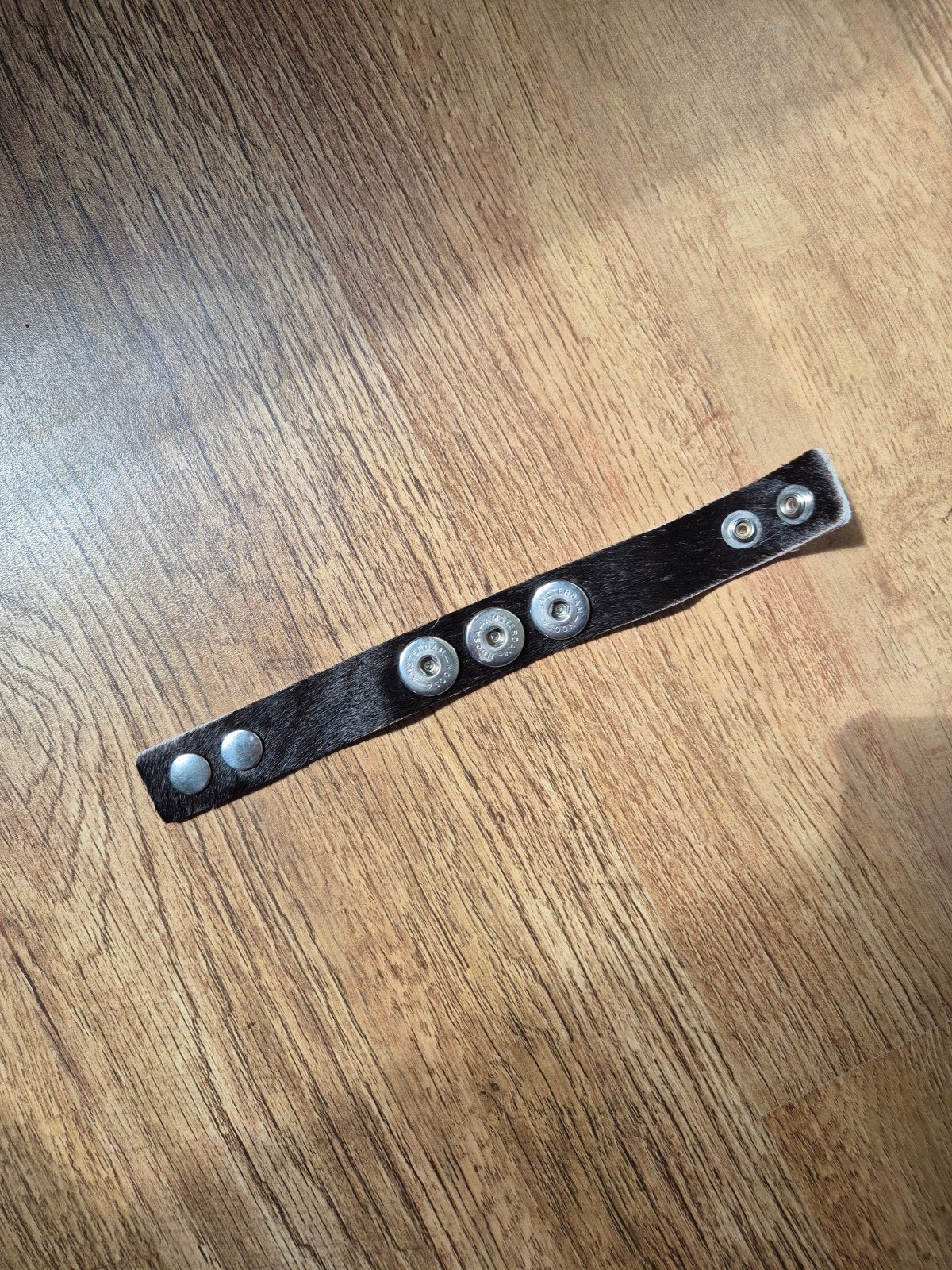 Noosa Amsterdam armband koeienvacht zwart, Ophalen of Verzenden, Zo goed als nieuw, Zwart, Leer