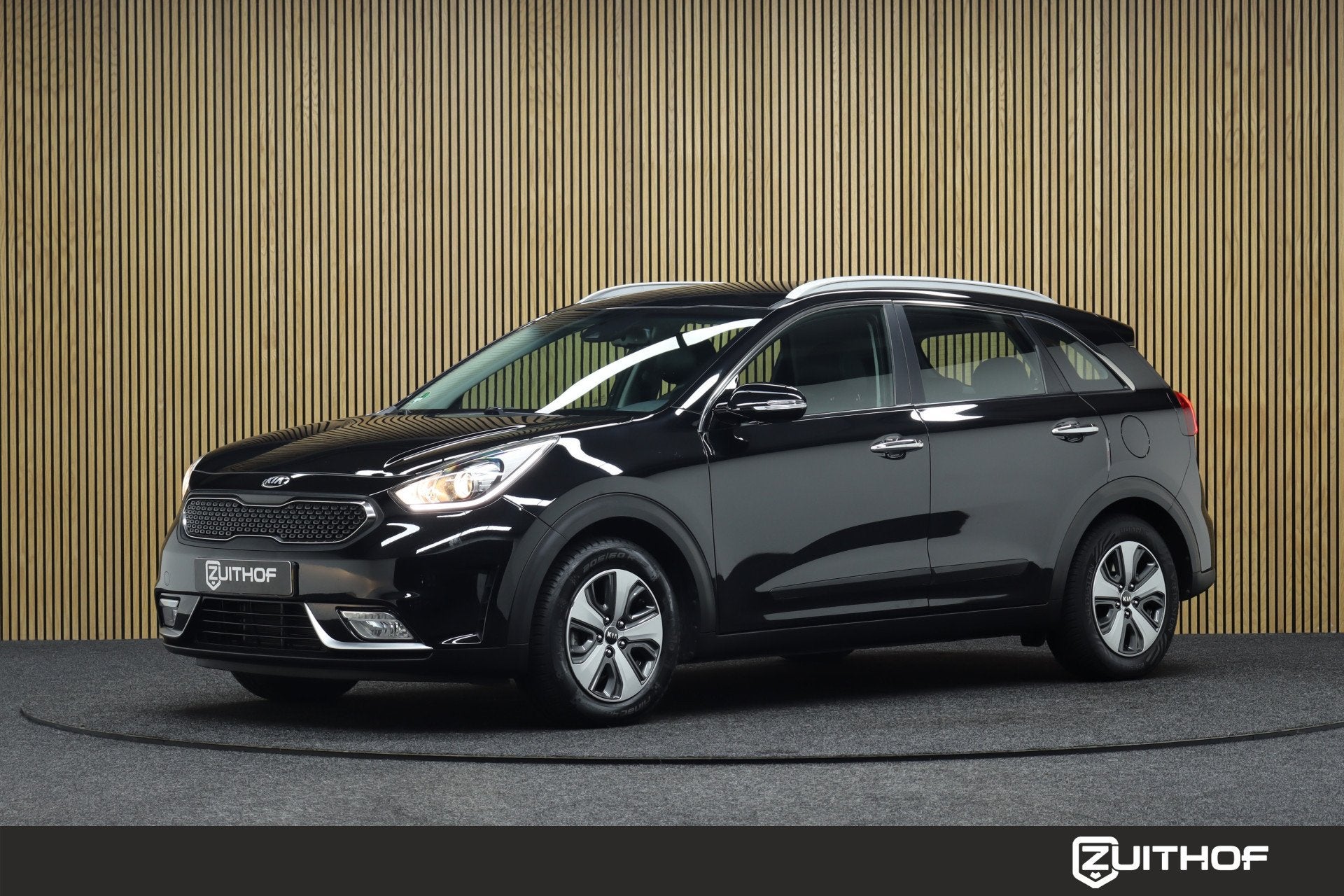 Kia Niro 1.6 GDi Hybrid DynamicLine | Afneembare Trekhaak |, Auto's, Kia, Gebruikt, Met garantie (alle), Leder en Stof, Zwart