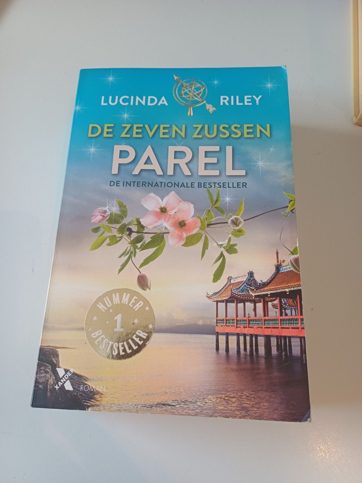 De zeven zussen  Parel  / Lucinda Riley, Boeken, Romans, Ophalen of Verzenden, Zo goed als nieuw