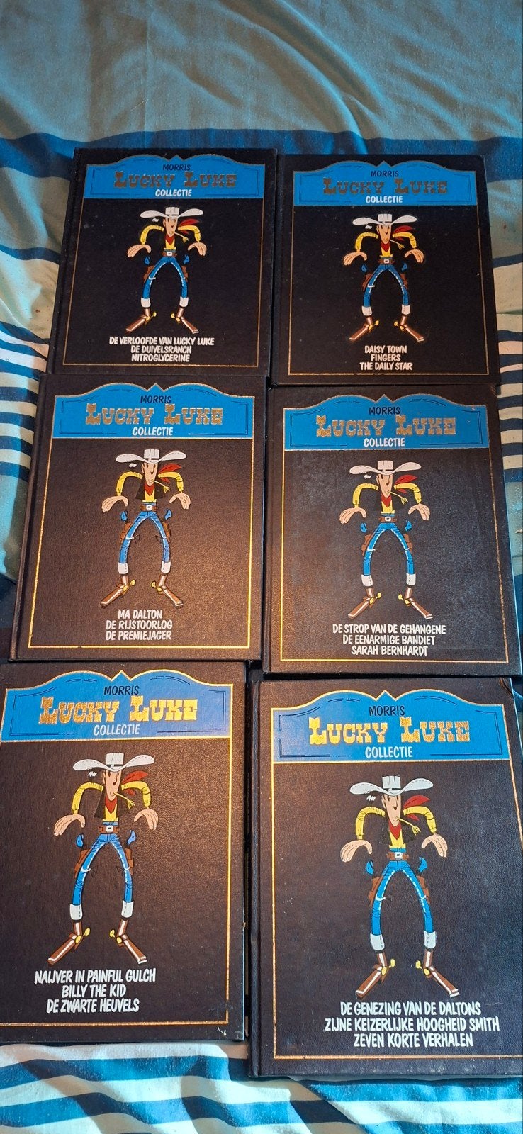 6 mooie Lucky Luke stripboeken - Morris Collectie, Meerdere stripboeken, Ophalen of Verzenden, Gelezen