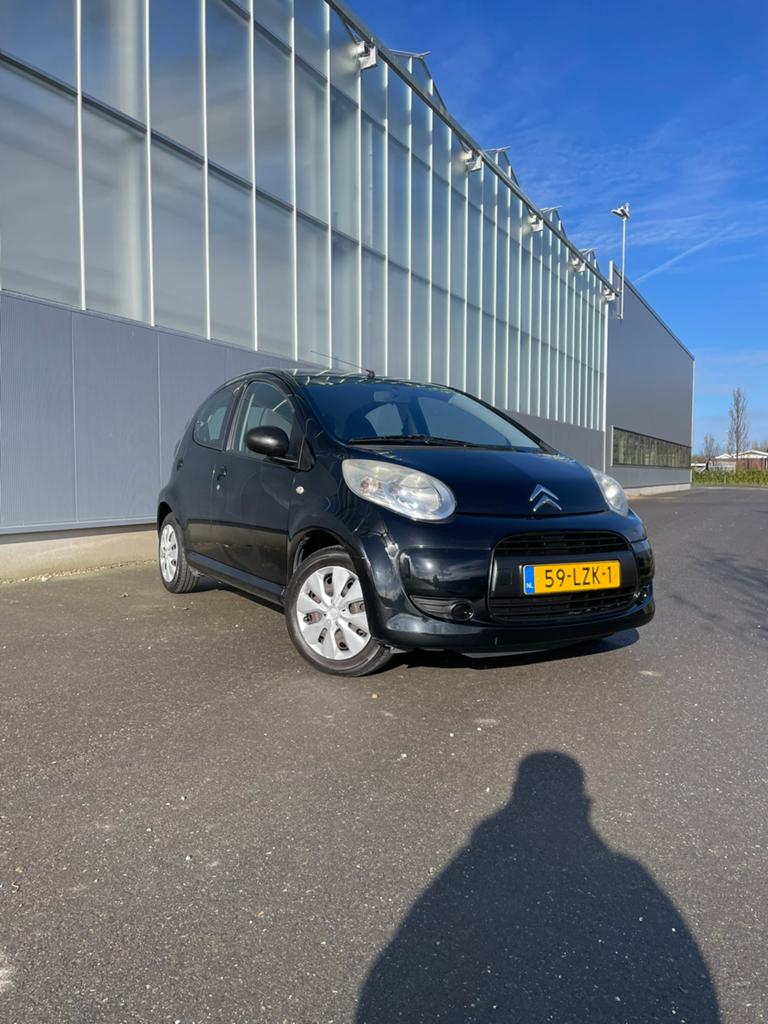 Citroën C1 1.0 5-DRS 2010 Zwart, Auto's, Citroën, Voorwielaandrijving, Stof, Zwart, 4 stoelen