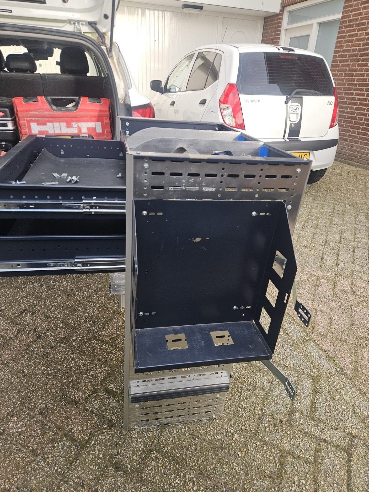 Sortimo Bedrijfswageninrichting - Lades en Rekken, Ophalen