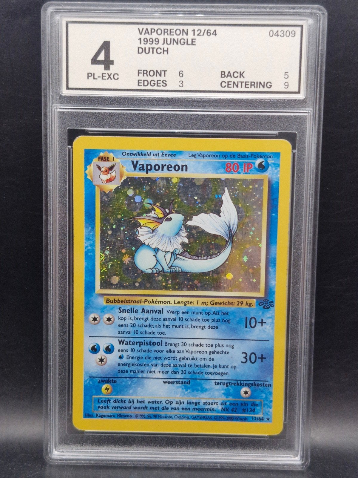 Vaporeon 1999 jungle dutch holo #12 woetoe Grading 4, Verzenden, Zo goed als nieuw, Losse kaart