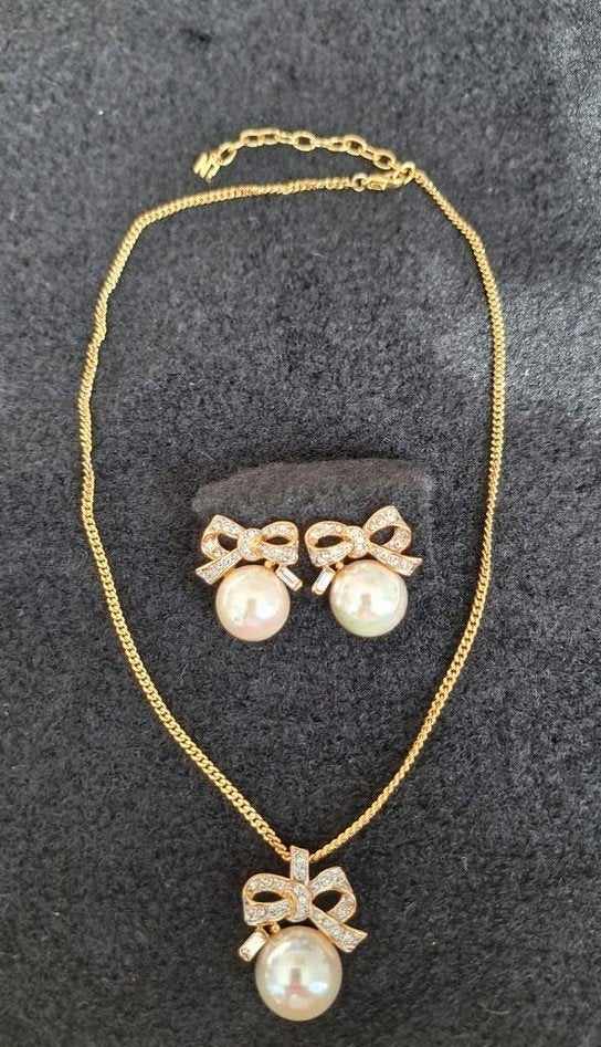 Vintage Nina Ricci sieraden set, 22krt verguld, Overige materialen, Ophalen of Verzenden, Goud, Verstelbaar