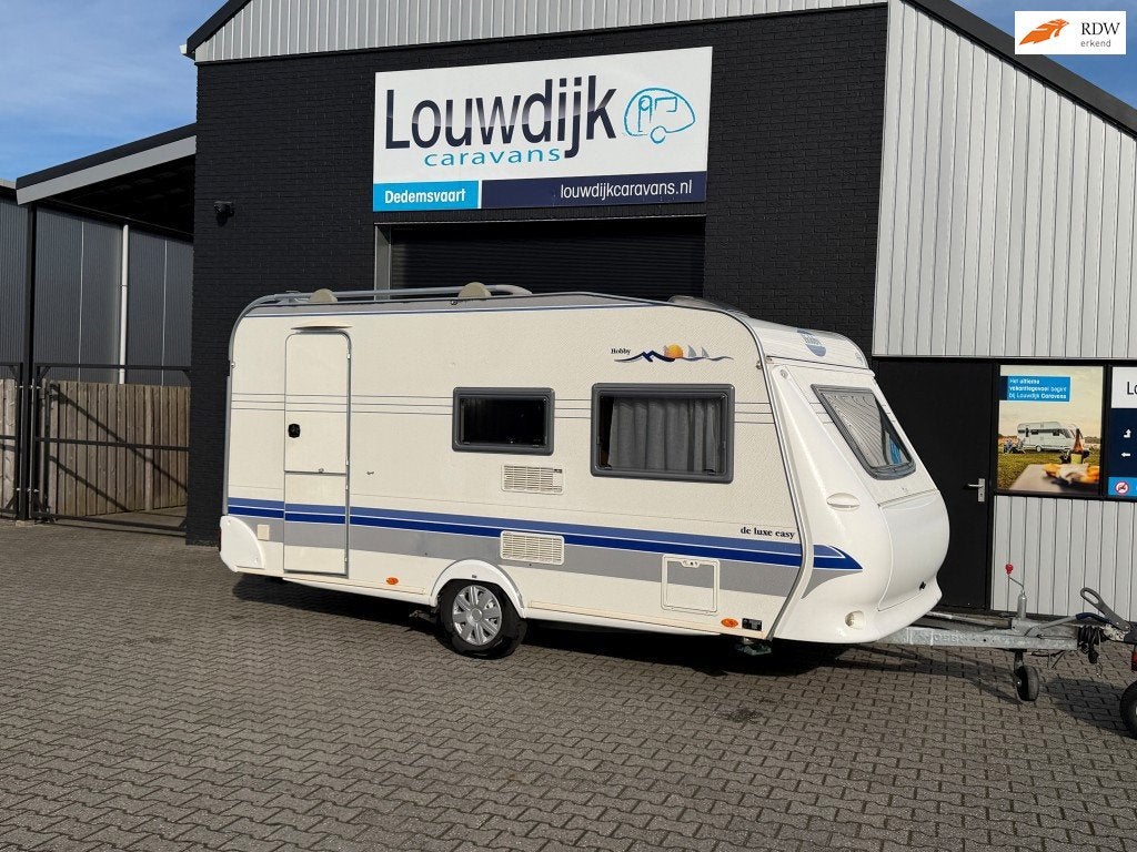 Hobby De Luxe 440 SF ’04 (Mover, Vastbed 210cm), Caravans en Kamperen, Vast bed, Hobby, Bedrijf, Treinzit