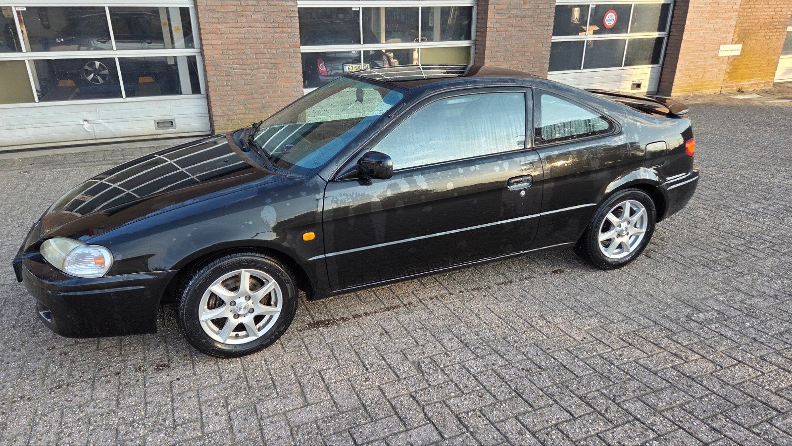 Toyota Paseo 1.5 I 1997 Zwart, Auto's, Voorwielaandrijving, 31 €/maand, 4 cilinders, Zwart