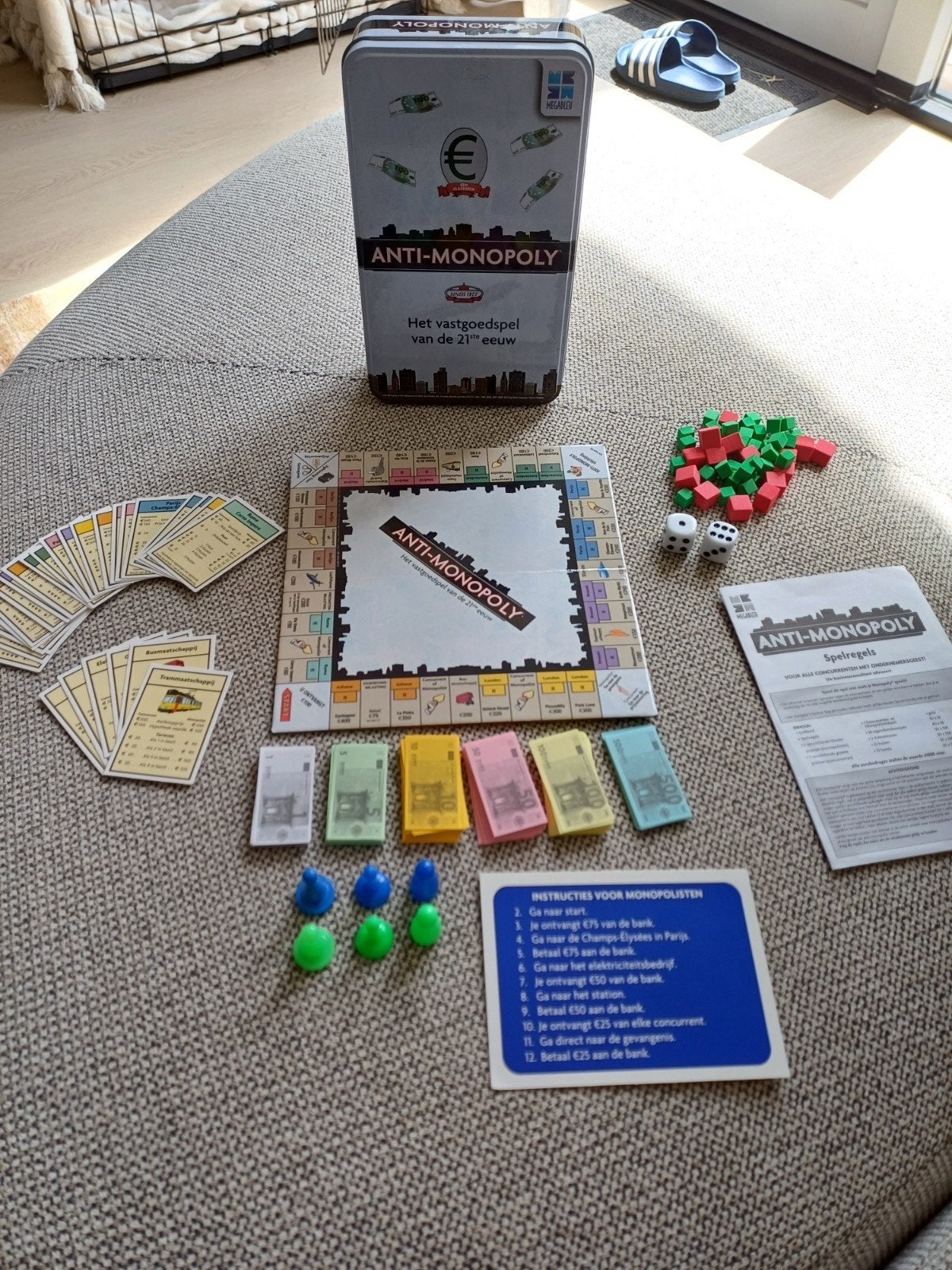 Anti Monopoly: Het compact spel in blik, Vijf spelers of meer, Ophalen of Verzenden, Gebruikt, Reisspel