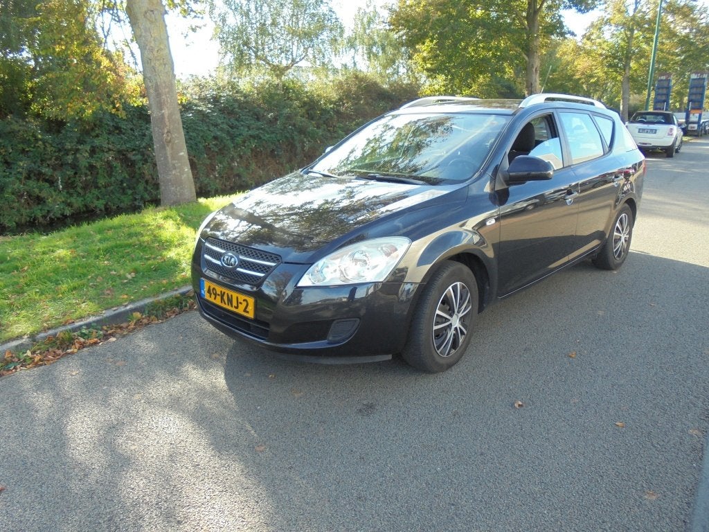Kia cee'd Sporty Wagon 1.4 CVVT X-tra, Auto's, Voorwielaandrijving, Gebruikt, 4 cilinders, Zwart