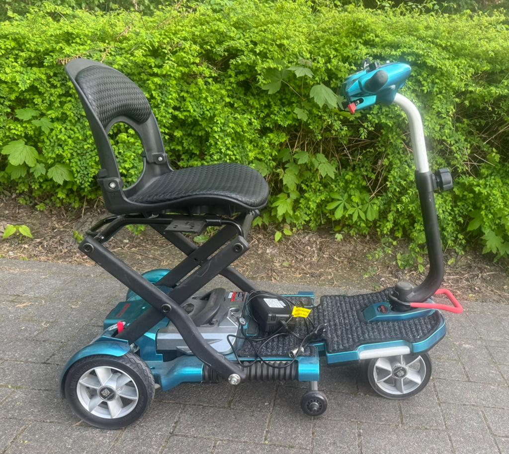 Vrijwel nieuwe lichtgewicht scootmobiel brio opvouwbaar, Ophalen of Verzenden, Zo goed als nieuw