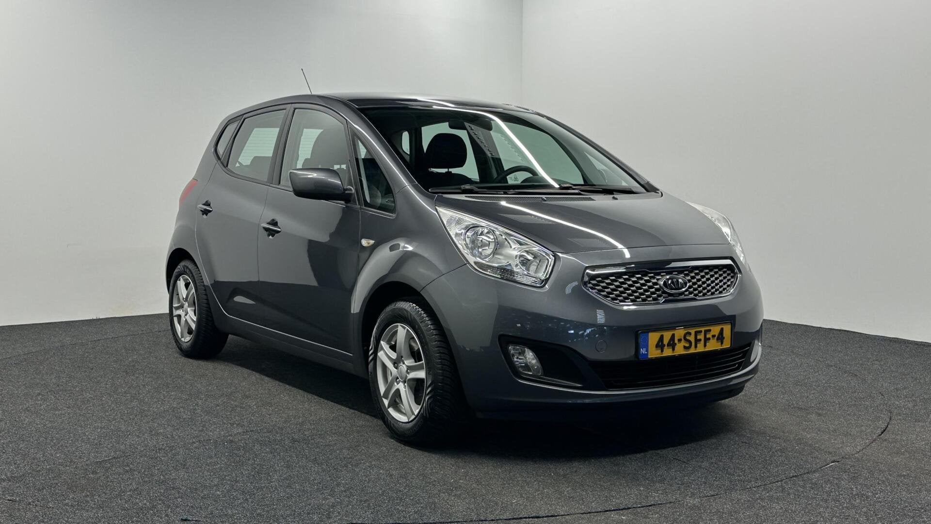 Kia Venga 1.4 CVVT Seven NAVI CAMERA ECC CRUISE LM TREKHAAK, Voorwielaandrijving, Euro 5, Stof, Gebruikt