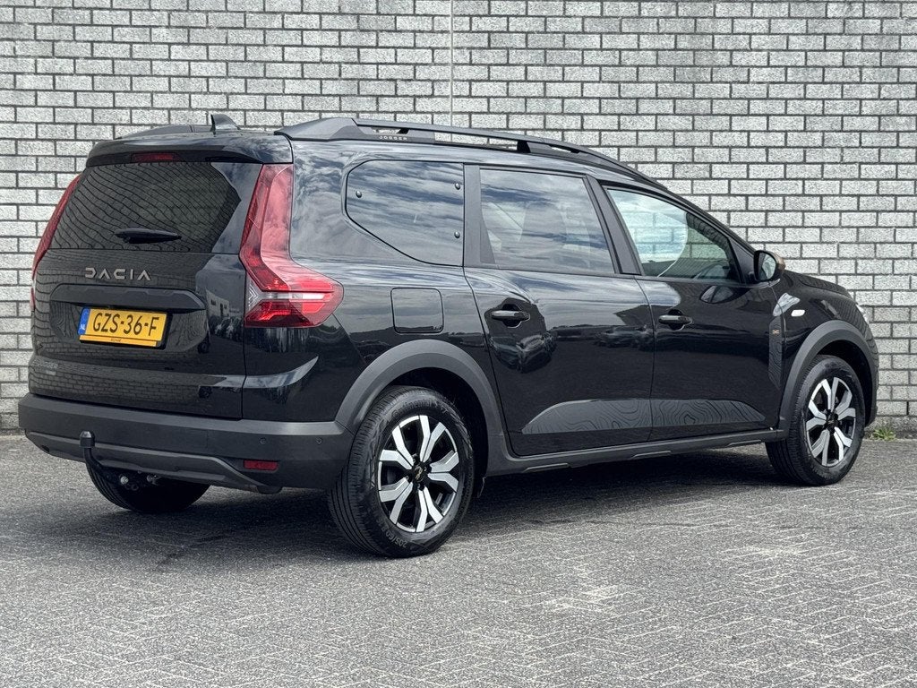 Dacia Jogger 1.6 Hybrid 140 Extreme 7p. | Trekhaak | Achteru, Auto's, Dacia, Gebruikt, 4 cilinders, Met garantie (alle), 7 stoelen