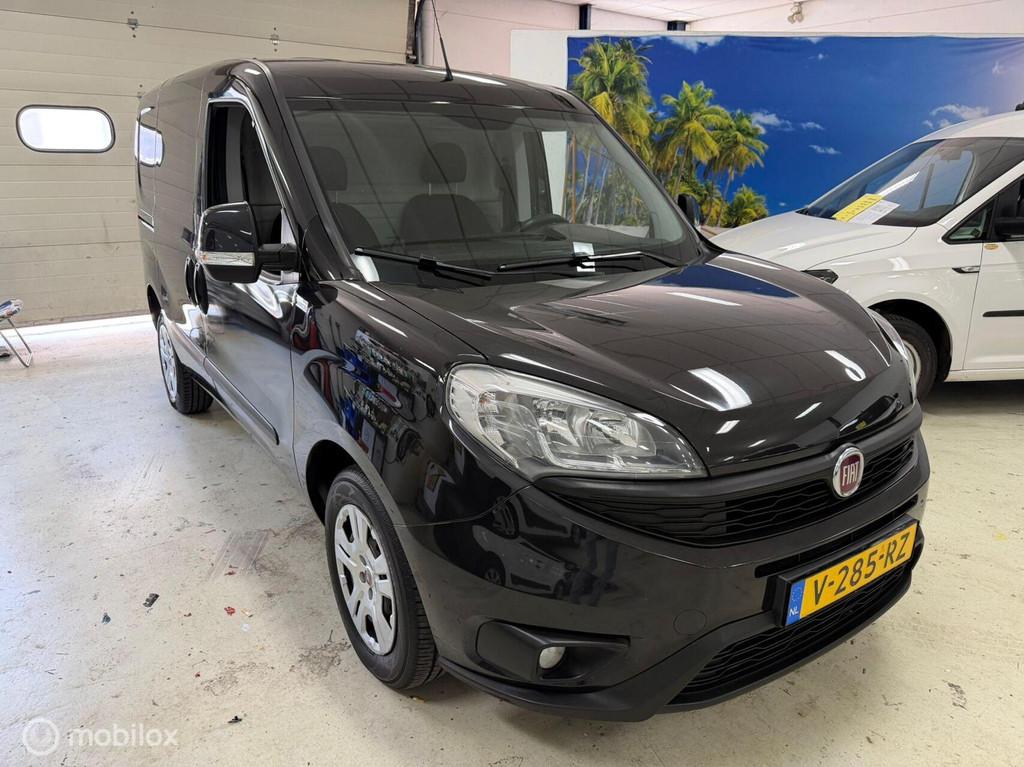 Fiat Doblo Cargo 1.3 MJ L1 Airco Cruise Navi, Auto's, Gebruikt, Euro 6, Electronic Stability Program (ESP), Zwart