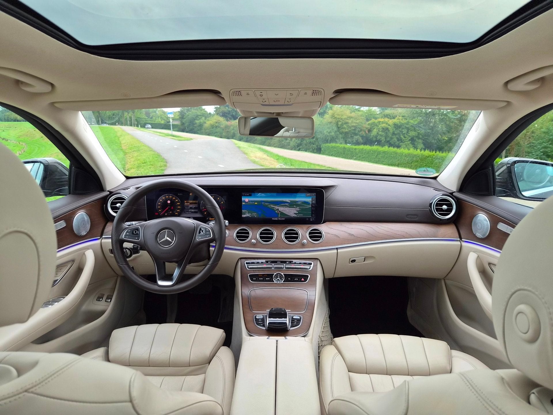 Mercedes-Benz E-klasse Estate 400 4MATIC Premium Plus Luxury, Auto's, Automaat, Dealer onderhouden, Gebruikt, Bruin