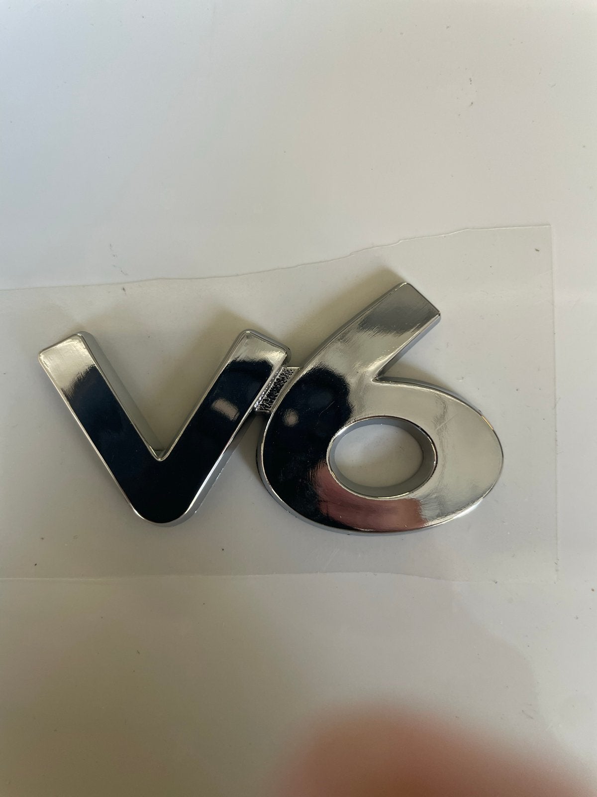 Zwaar verchroomd zelfklevend V6 embleem, Ophalen of Verzenden, Nieuw