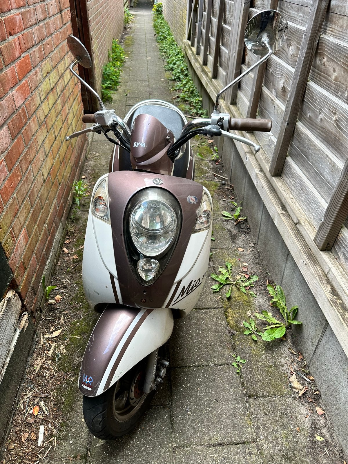 SYM Mio brom, Fietsen en Brommers, Gebruikt, Maximaal 45 km/u, Benzine, Ophalen