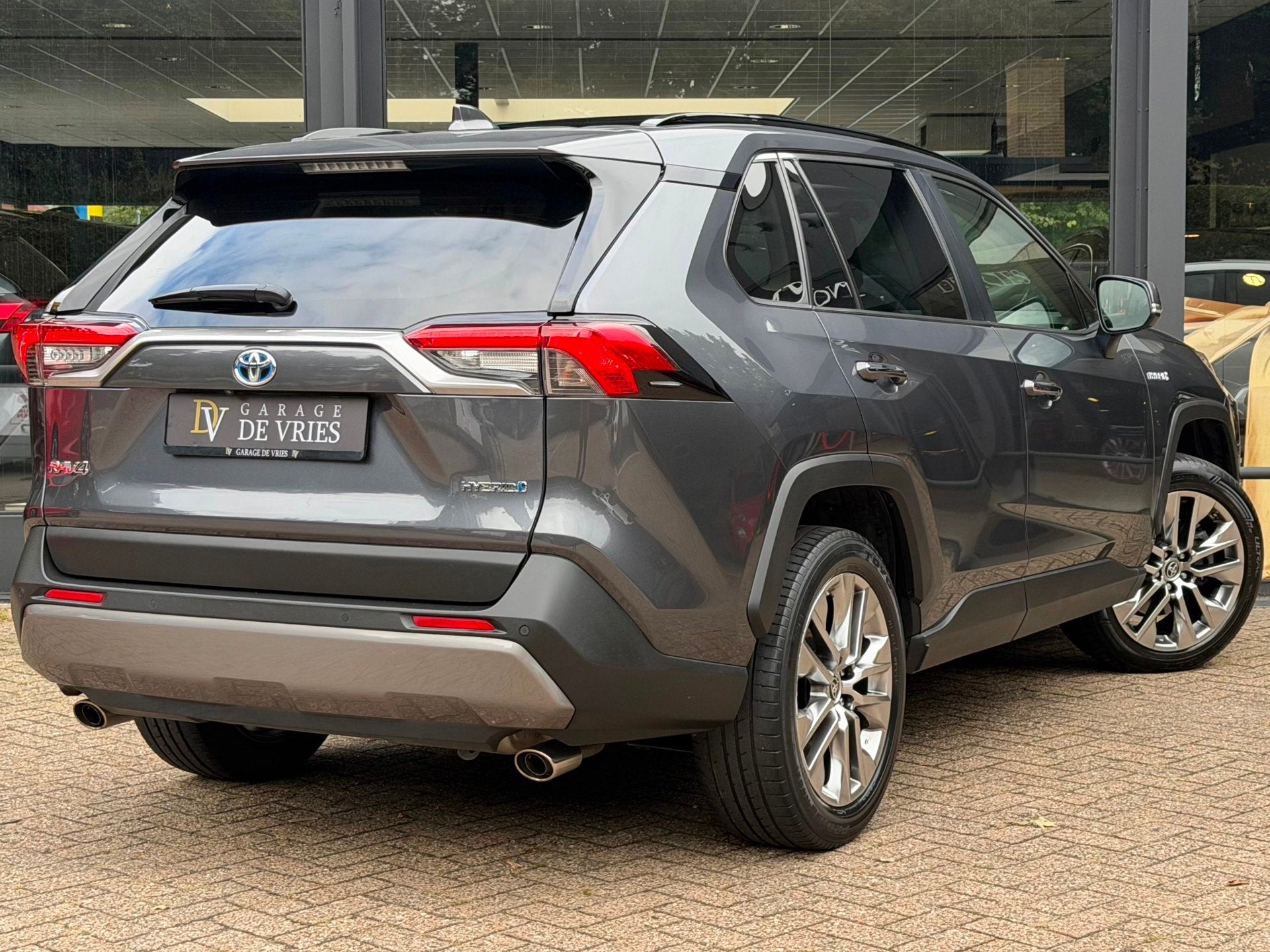 Toyota RAV4 2.5 Hybrid Executive Panoramadak Full Option ACC, Dealer onderhouden, Gebruikt, Zwart, 4 cilinders