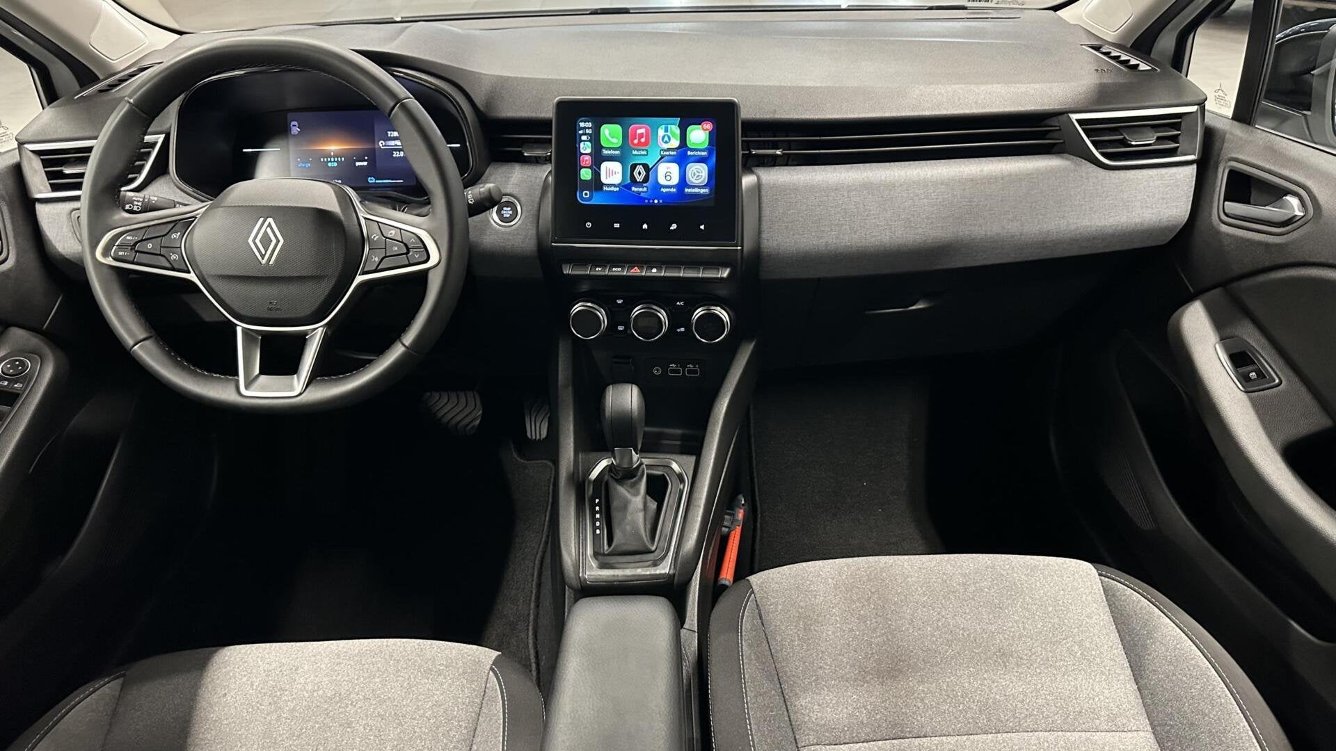 Renault Clio 1.6 E-Tech Full Hybrid 145 evolution CAMERA NAV, Auto's, Stof, Gebruikt, Met garantie (alle), Wit