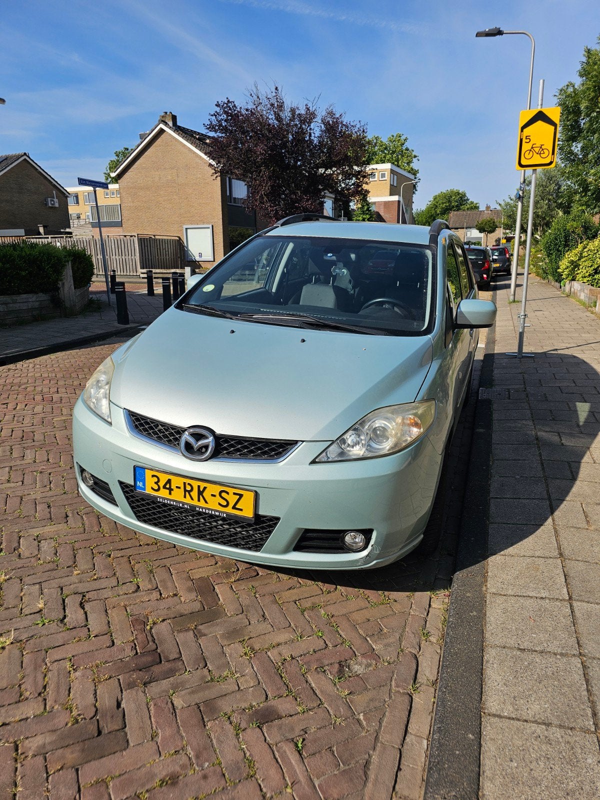 Mazda 5 1.8 2005 Grijs, Auto's, Mazda, Stof, 4 cilinders, 7 stoelen, Origineel Nederlands