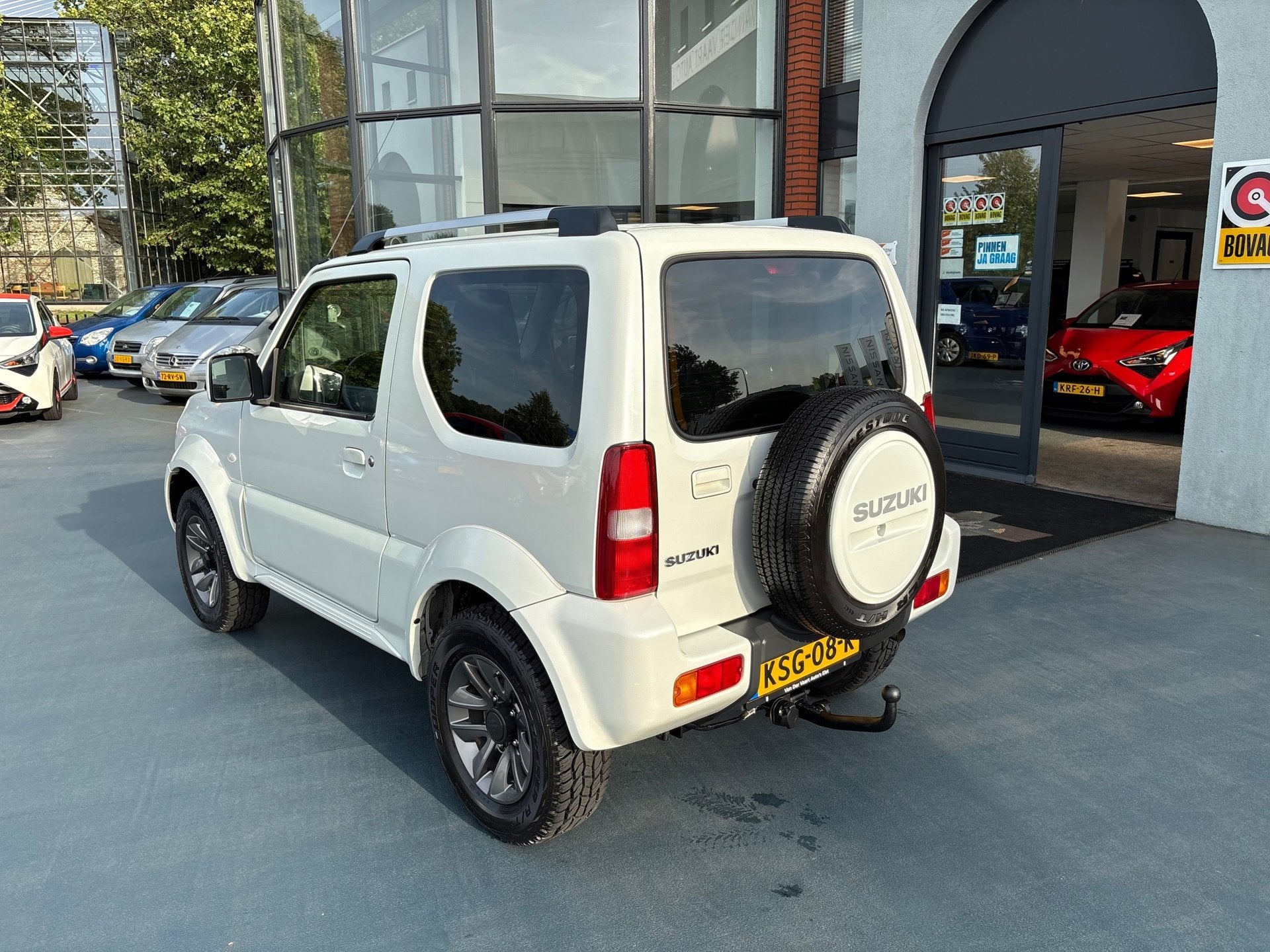 Suzuki JIMNY 1.3 Exclusive LEDER STOELVERWARMING AIRCO LMV, Auto's, Dealer onderhouden, Gebruikt, Euro 6, 4 stoelen