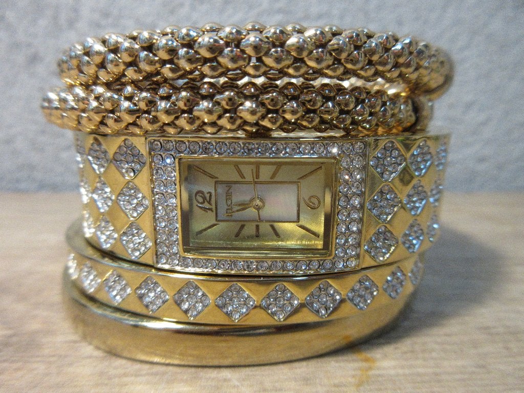 Goudkleurig Elgin horloge met armbanden, Overige merken, Staal, Gebruikt, Polshorloge