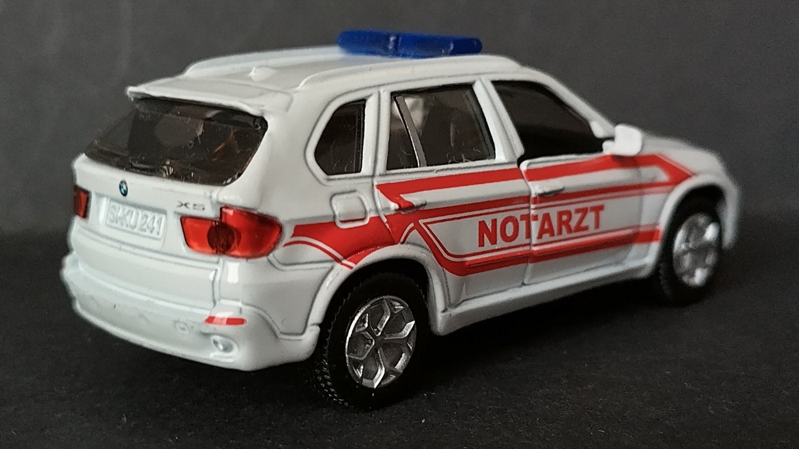Bmw X5 4.8 Notarzt 1:55 Siku Pol, Hobby en Vrije tijd, Auto, Ophalen of Verzenden, Zo goed als nieuw, Sieper