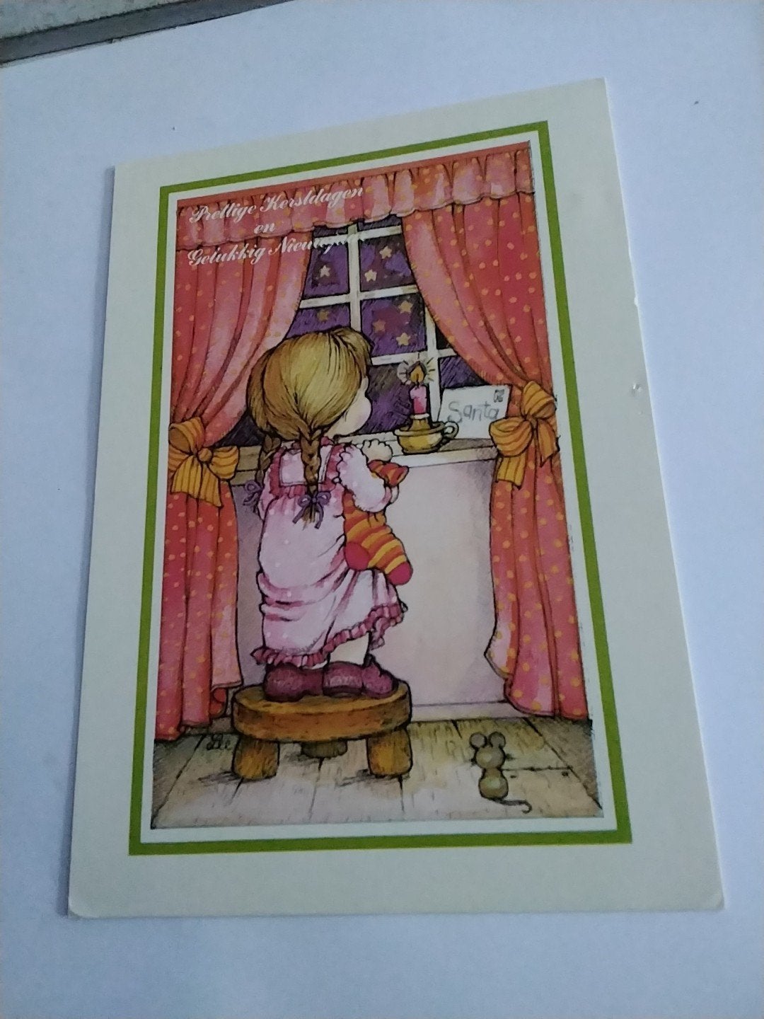 Kerstkaart: Meisje kijkt uit raam naar sterren /LEE  1984, Ophalen of Verzenden