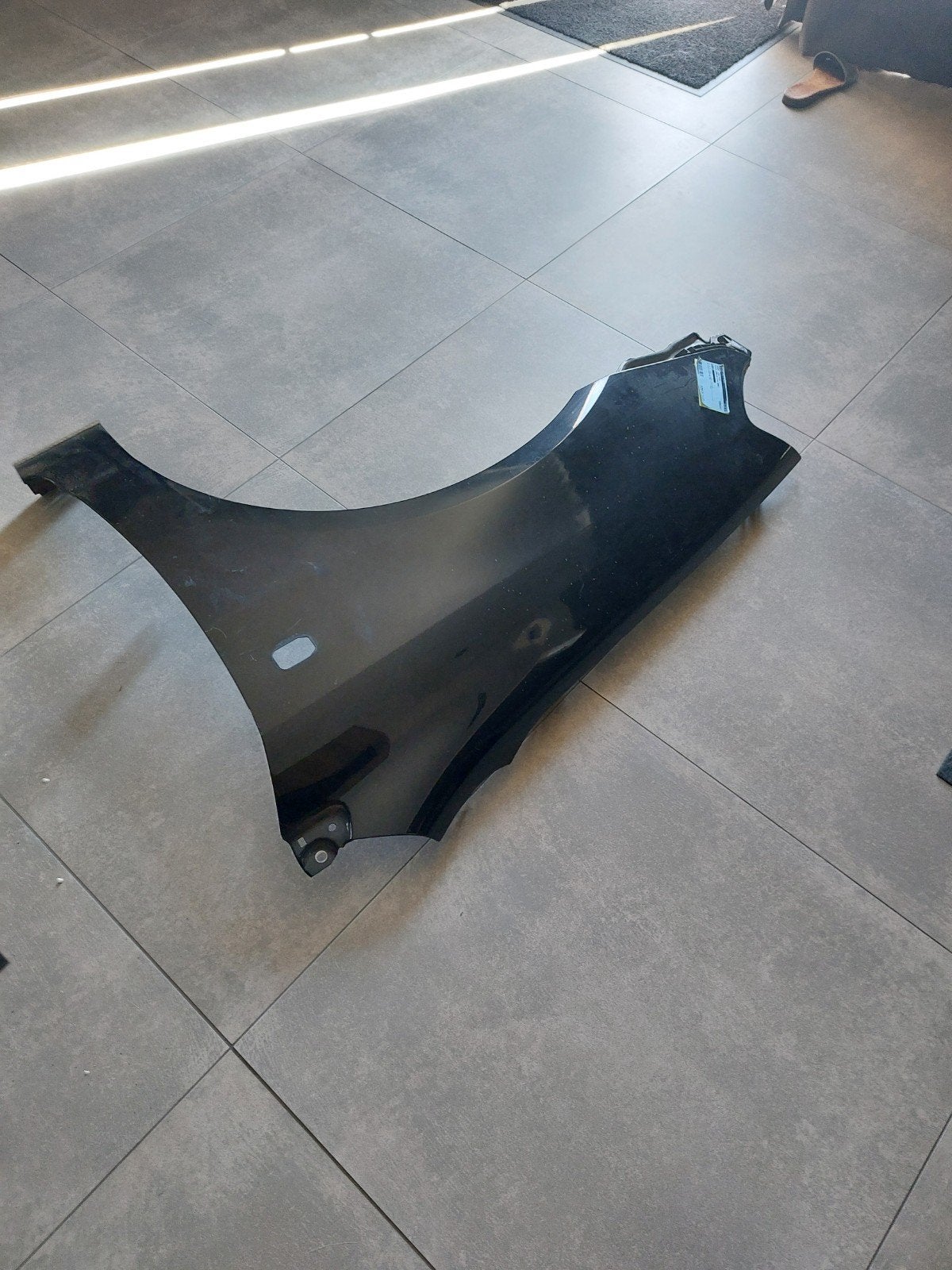 Spatboard Corrolla 2002-2007 links zwart, Auto-onderdelen, Carrosserie en Plaatwerk, Gebruikt, Voor, Ophalen of Verzenden, Spatbord