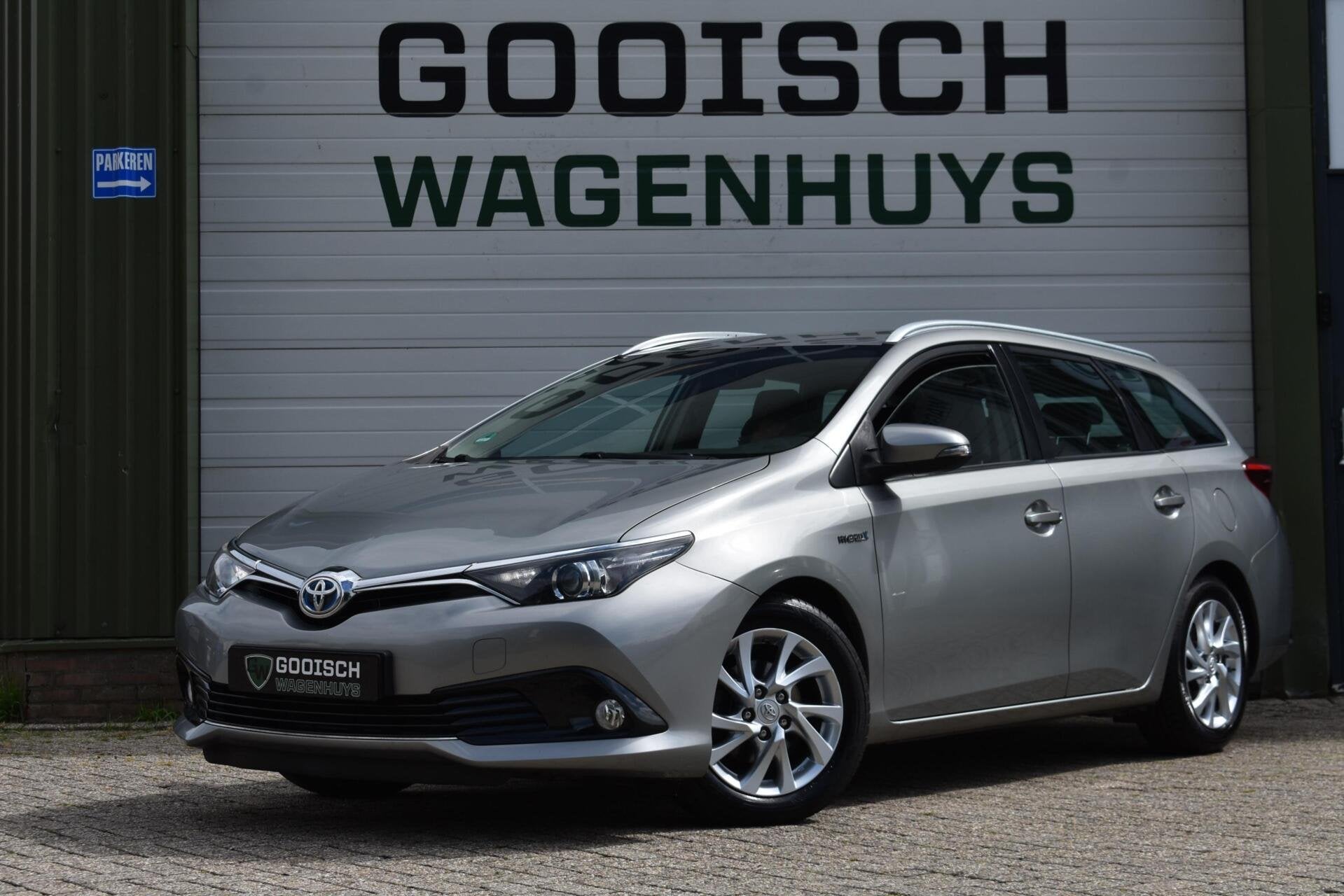Toyota Auris 1.8 Hybrid Dynamic | Camera | Navigatie | Clima, Euro 6, Met garantie (alle), Hybride Elektrisch/Benzine, Start-stop-systeem