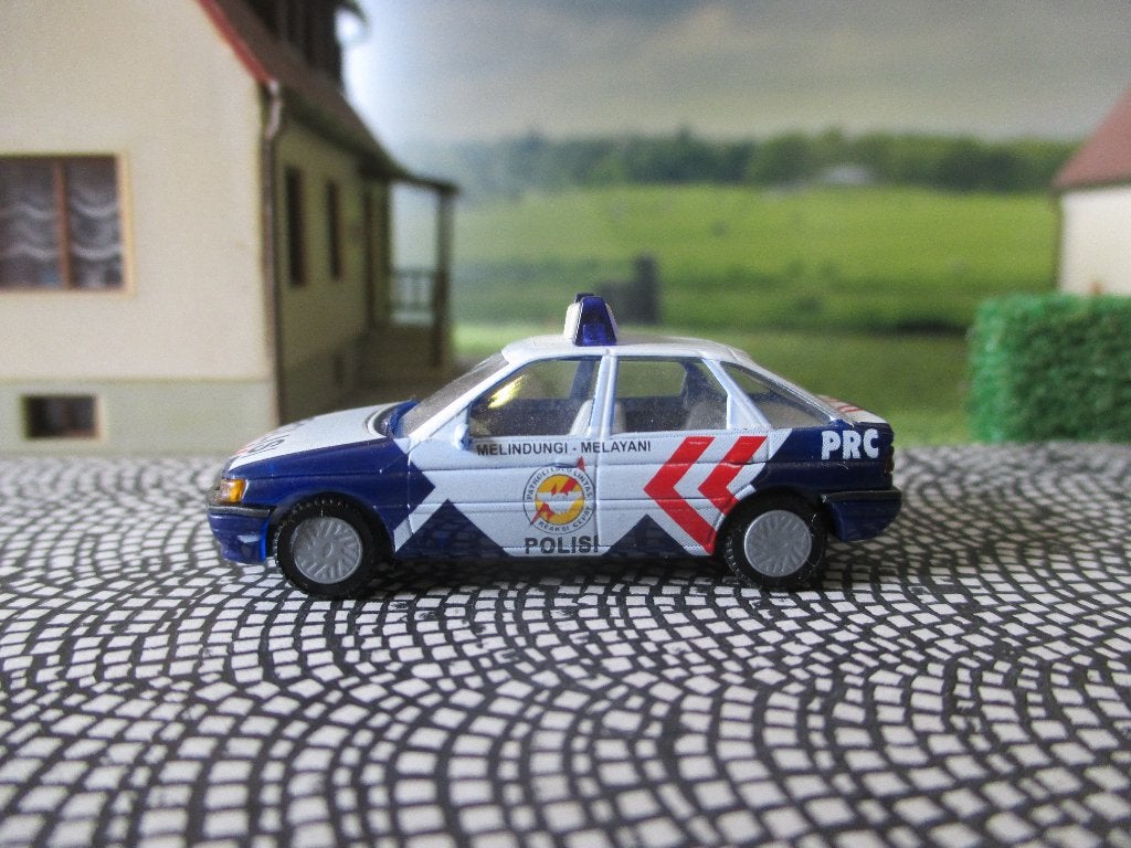 Ford Escort Mk.5 - Praliné POLISI Politie Indonesië, Ophalen of Verzenden, Zo goed als nieuw, Auto, Overige merken
