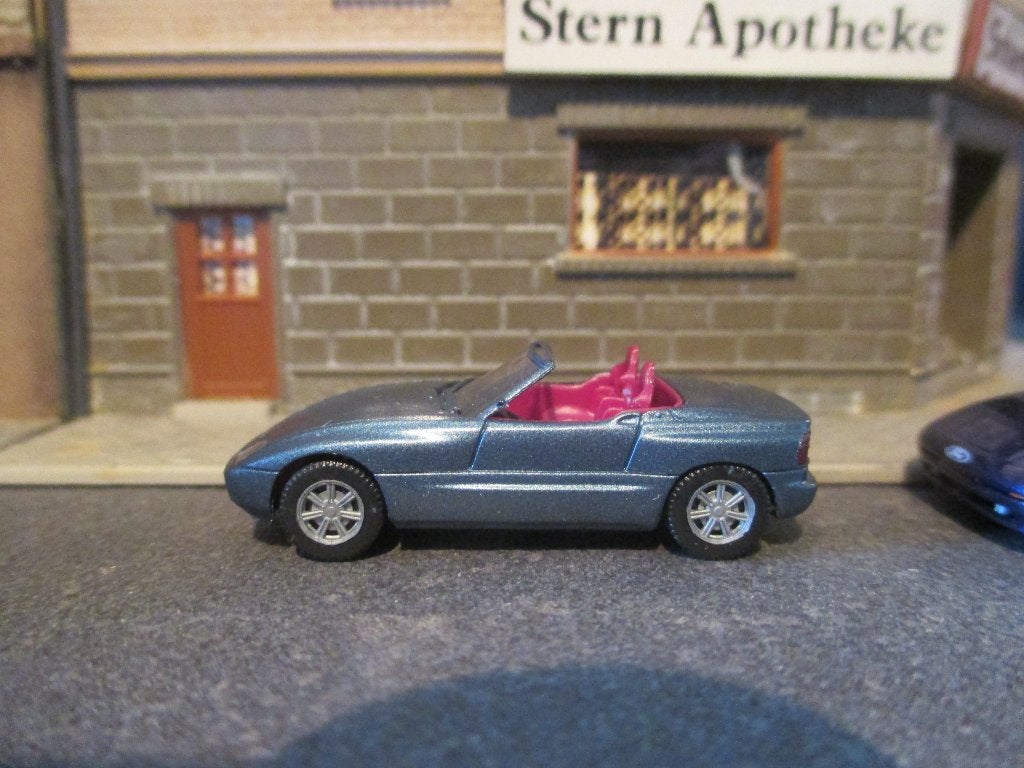 BMW E30 Z1 - Herpa staalblauw-metallic, Ophalen of Verzenden, Nieuw, Auto, Herpa