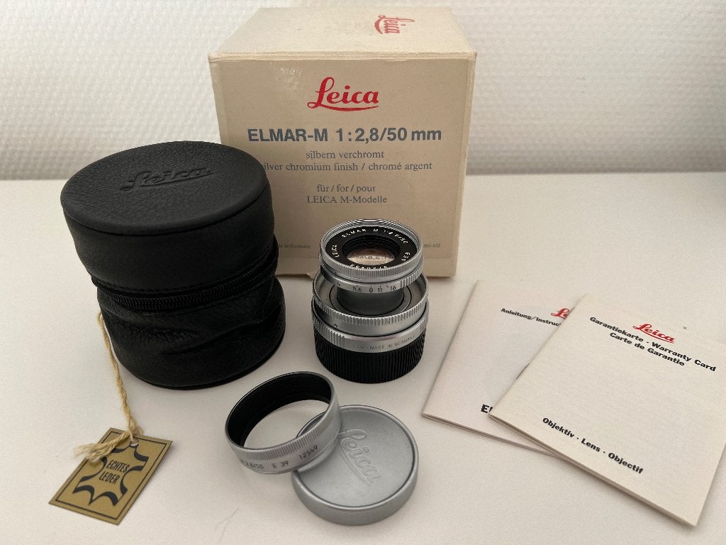 Leica 11823 Elmar-M 1:2.8 / 50 Silver Boxed + UVa II E39, Gebruikt, Beschermhoes/tas, Ophalen of Verzenden, Standaardlens