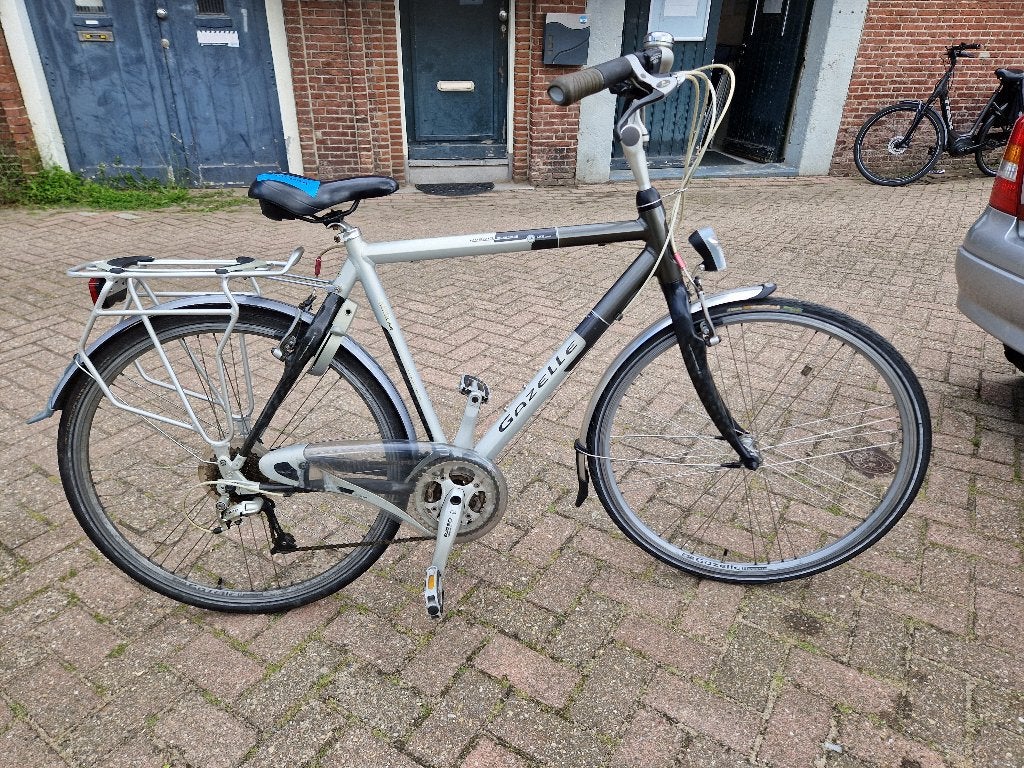 Koop bij ons uw heren toerfiets en steun gelijk de stichting, Fietsen en Brommers, Ophalen, Zo goed als nieuw, Gazelle, Minder dan 10 versnellingen